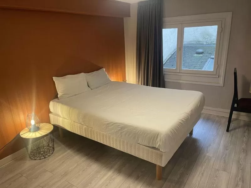 Bed in Hotel de la Gare