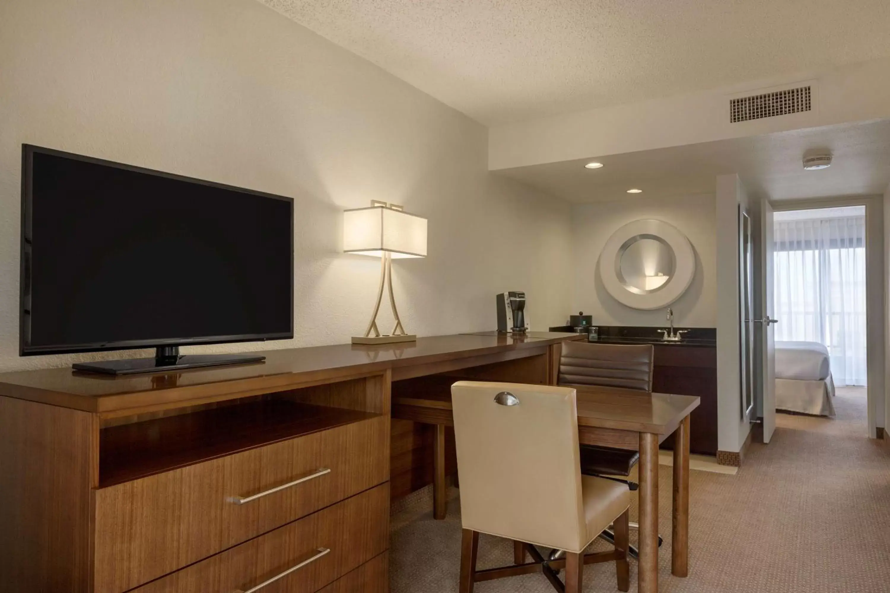 Living room, TV/Entertainment Center in Embassy Suites Baton Rouge