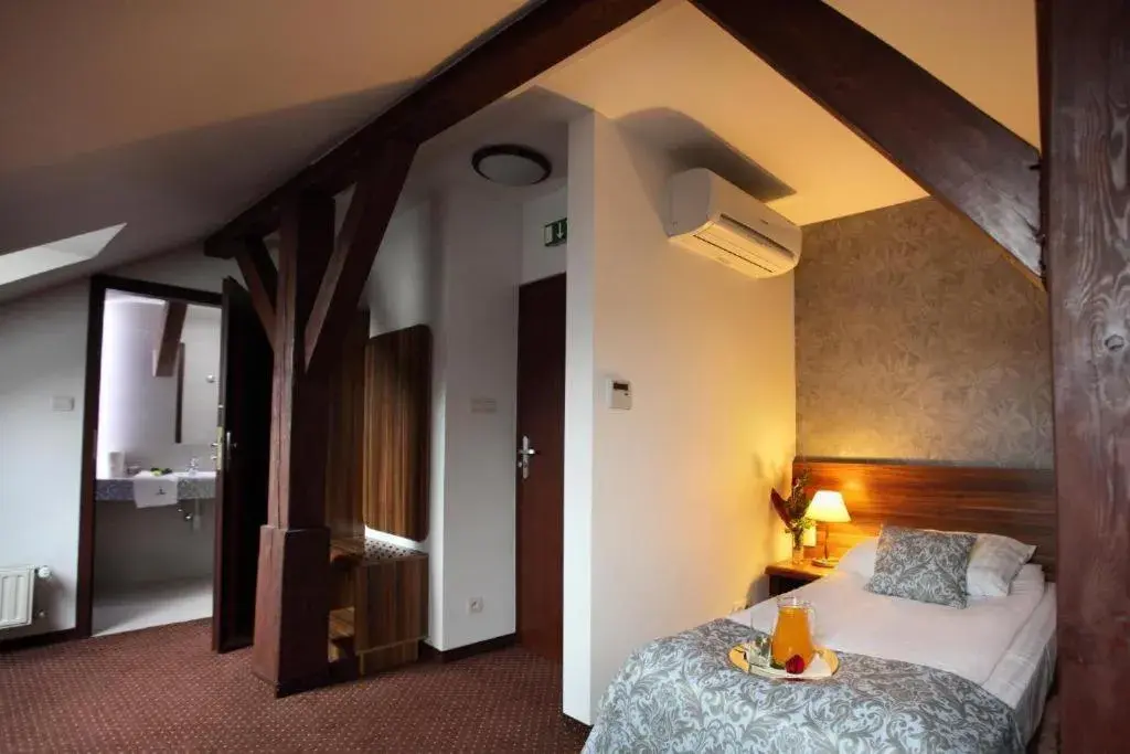 Bed in Hotel Wit Stwosz