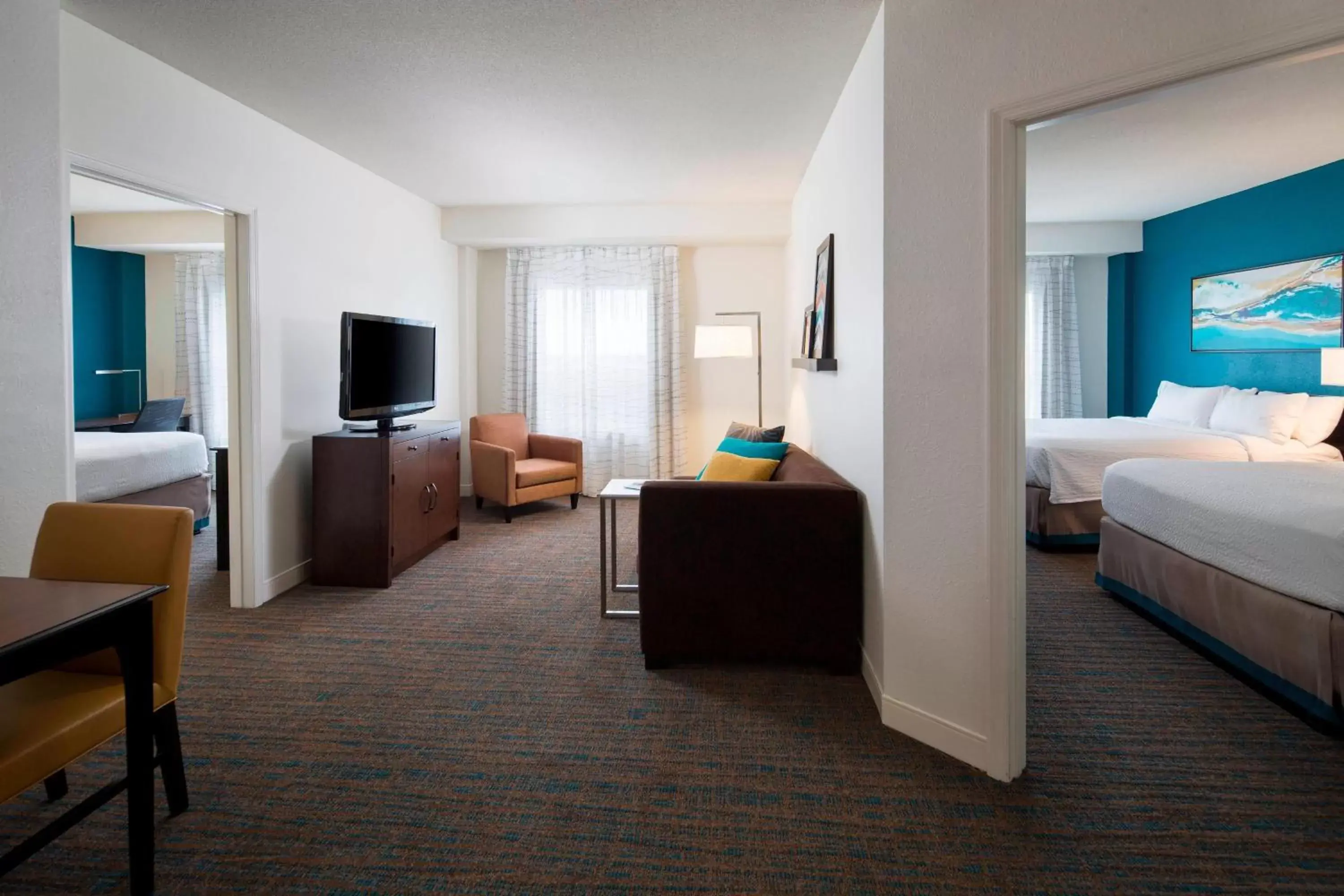 Bedroom, TV/Entertainment Center in Residence Inn by Marriott Orlando at SeaWorld