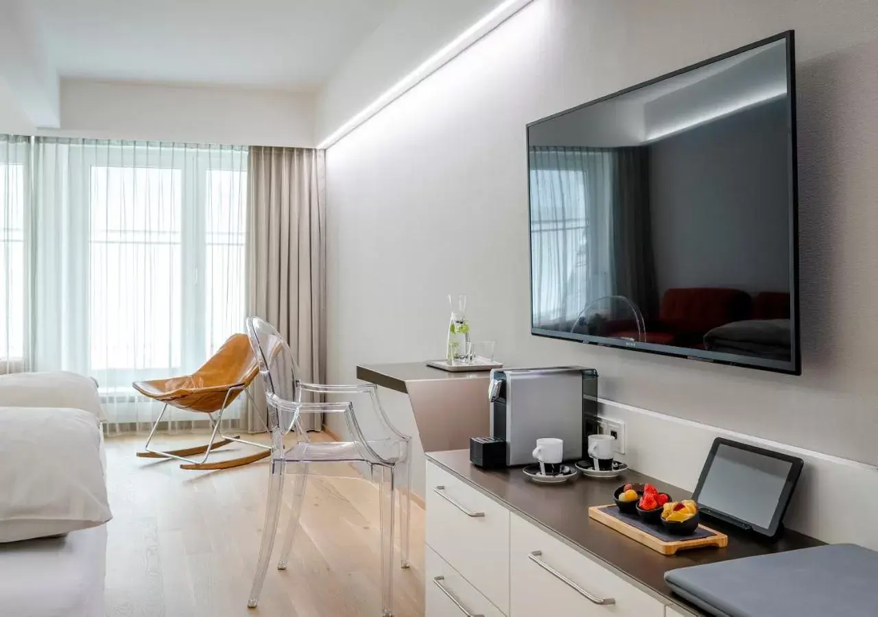 TV and multimedia, TV/Entertainment Center in Boutique Hotel Hauser