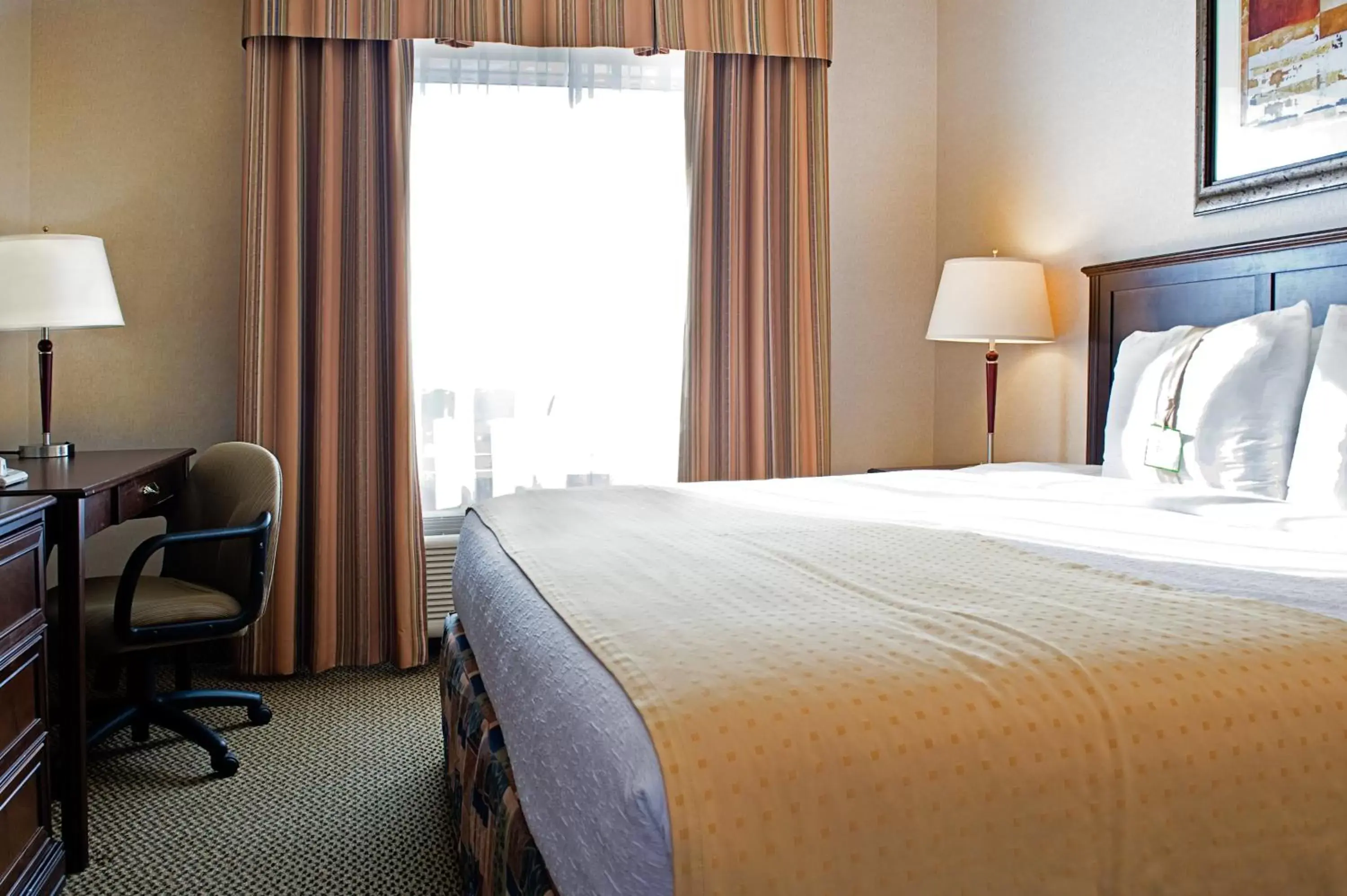 Bedroom, Bed in Holiday Inn Hotel & Suites-West Edmonton, an IHG Hotel
