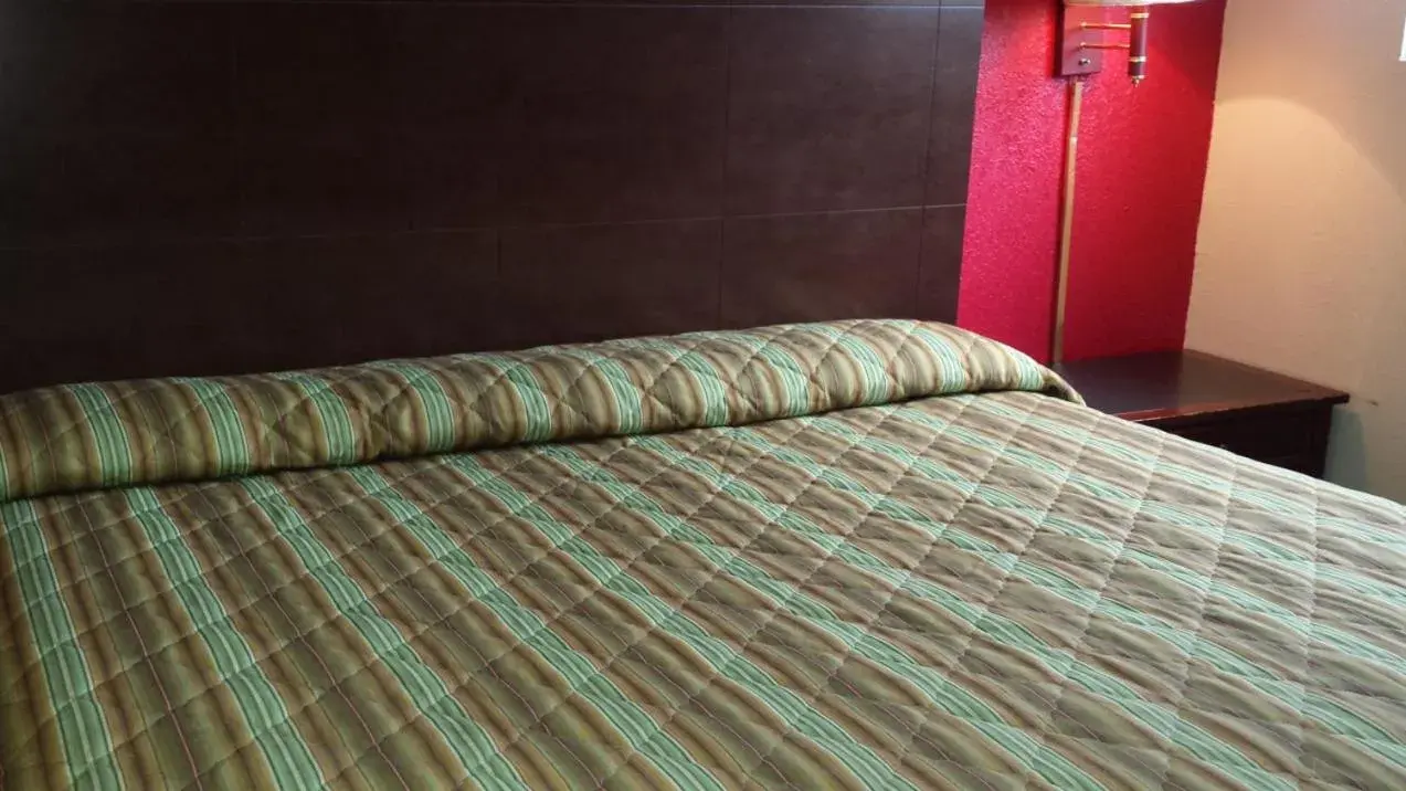 Bed in Hallmark Motel