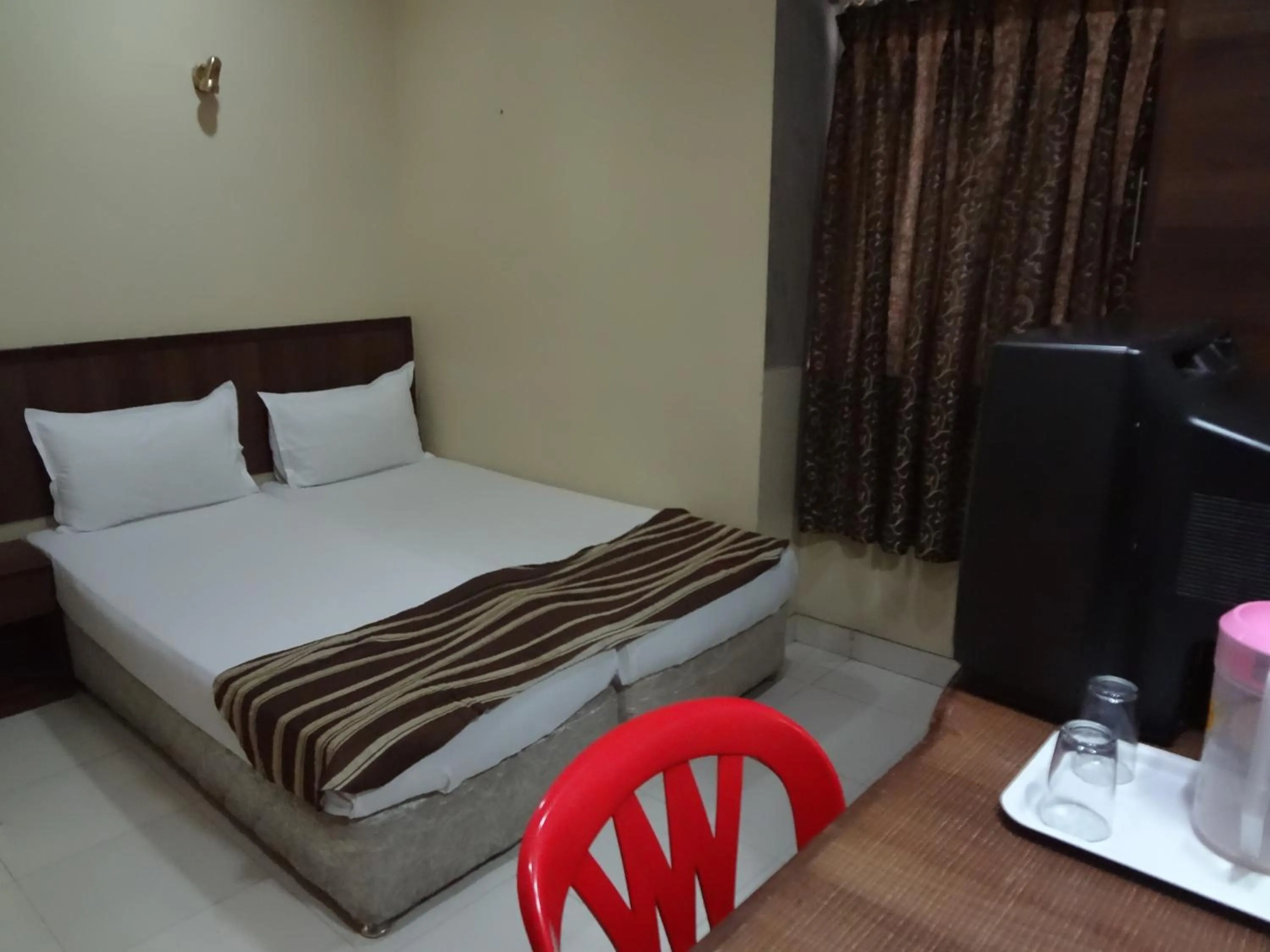 Bed in Hotel New Bengal