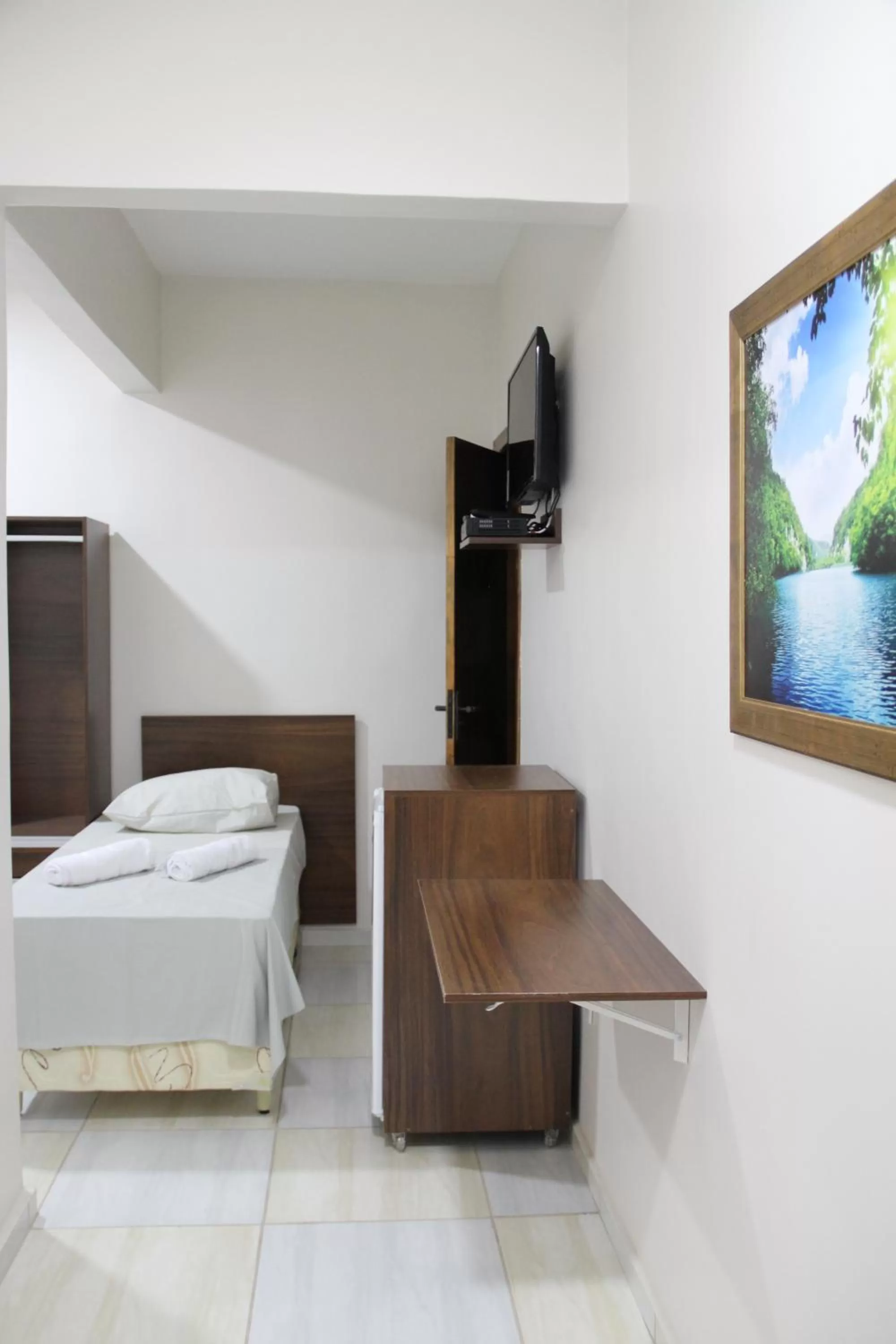 Photo of the whole room, TV/Entertainment Center in Hotel Joia Fina