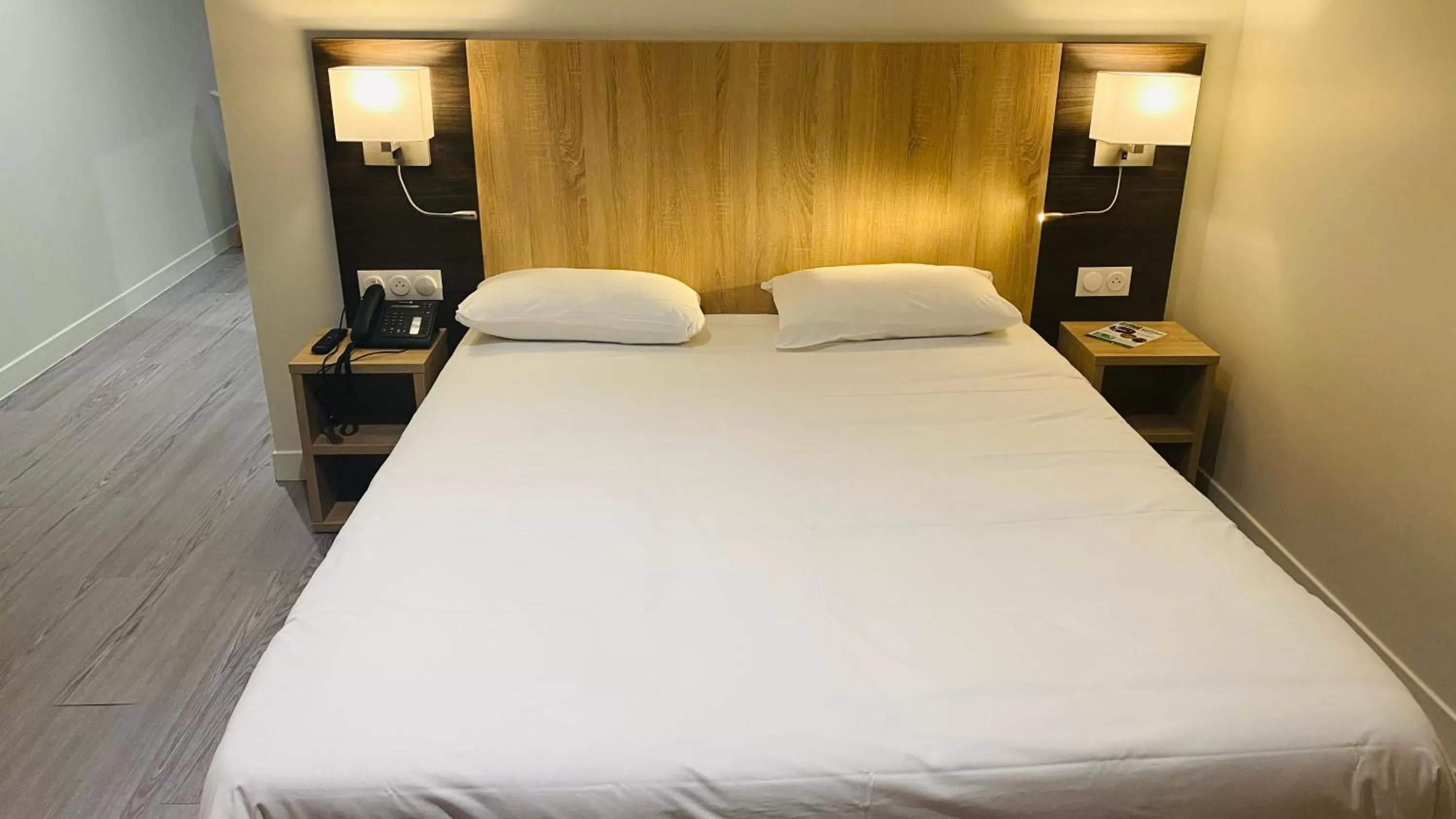 Bed in Hotel Martinez Grenay