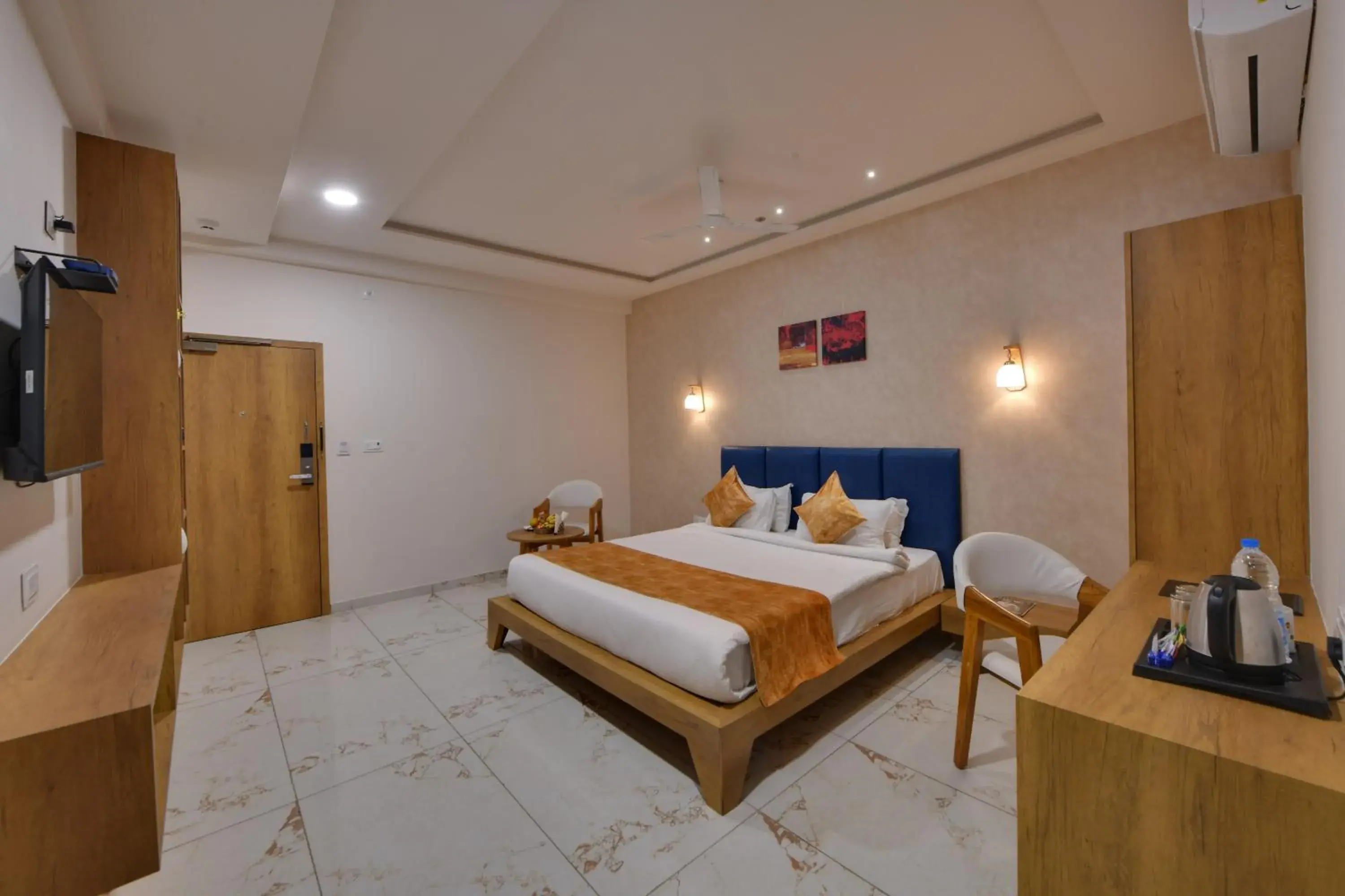 Bed in Click Hotel Tulsi