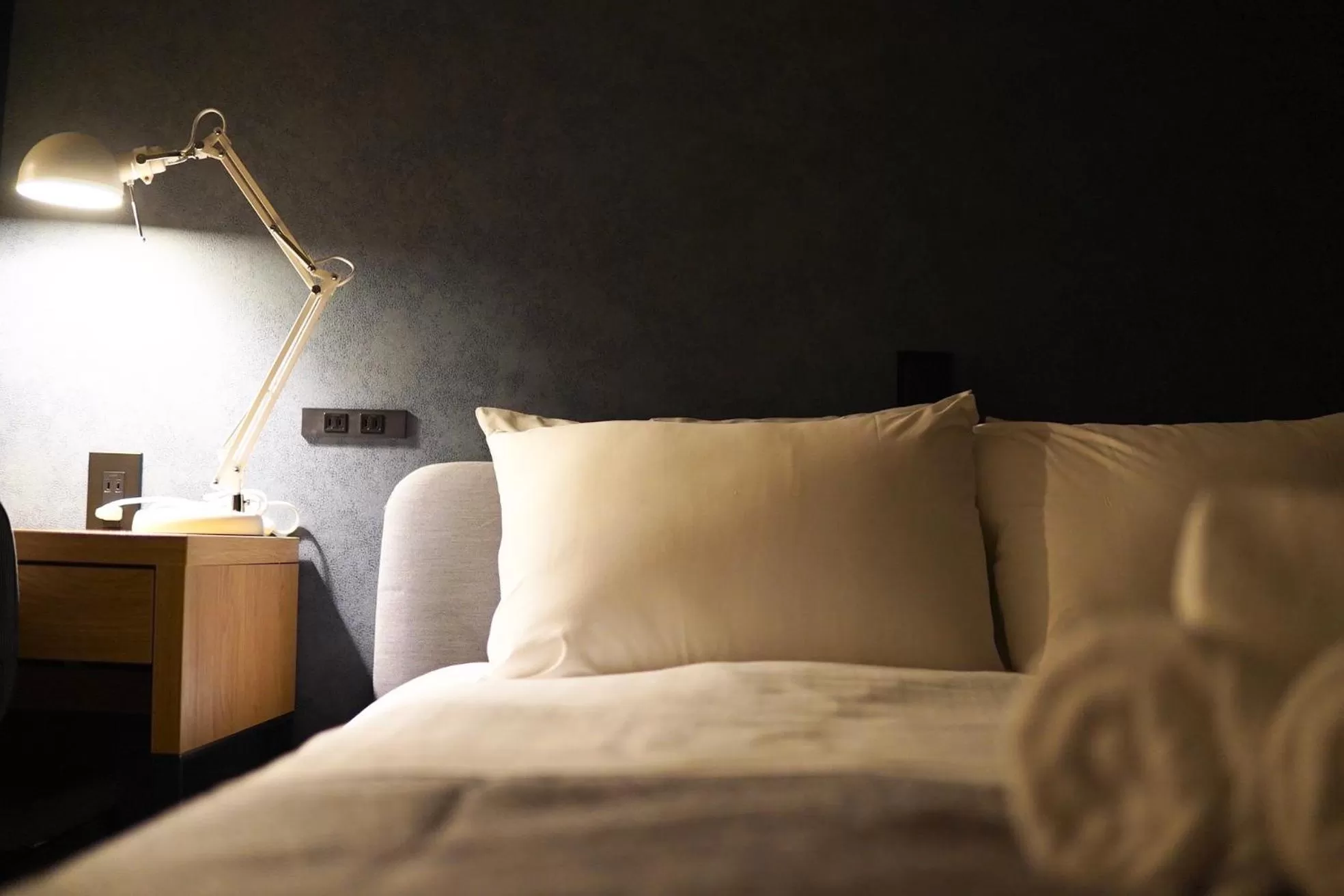 Bed in TAKETO STAY PREMIERE SAPPORO Eki