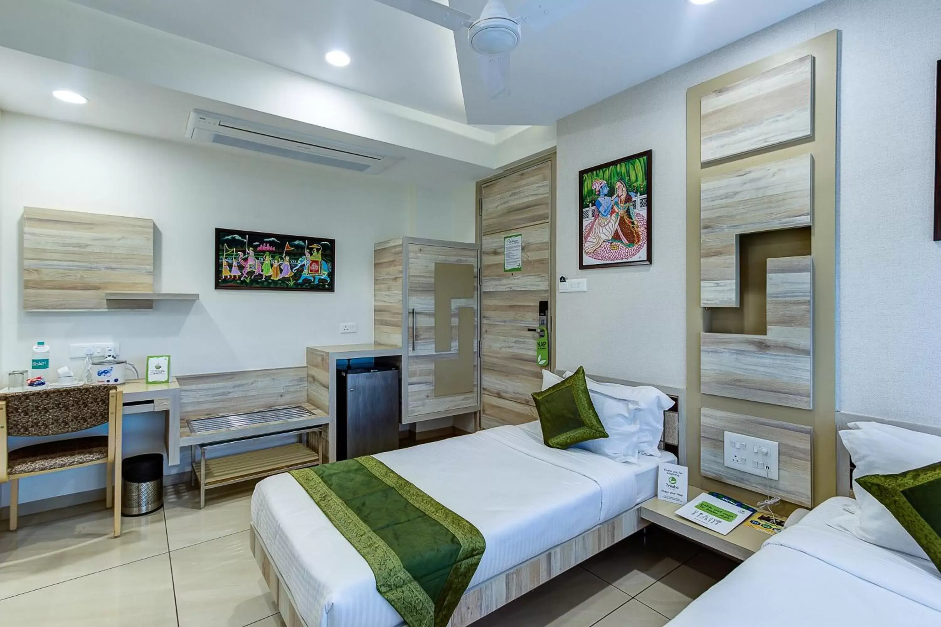 Bed in Treebo Trend Daksh Residency