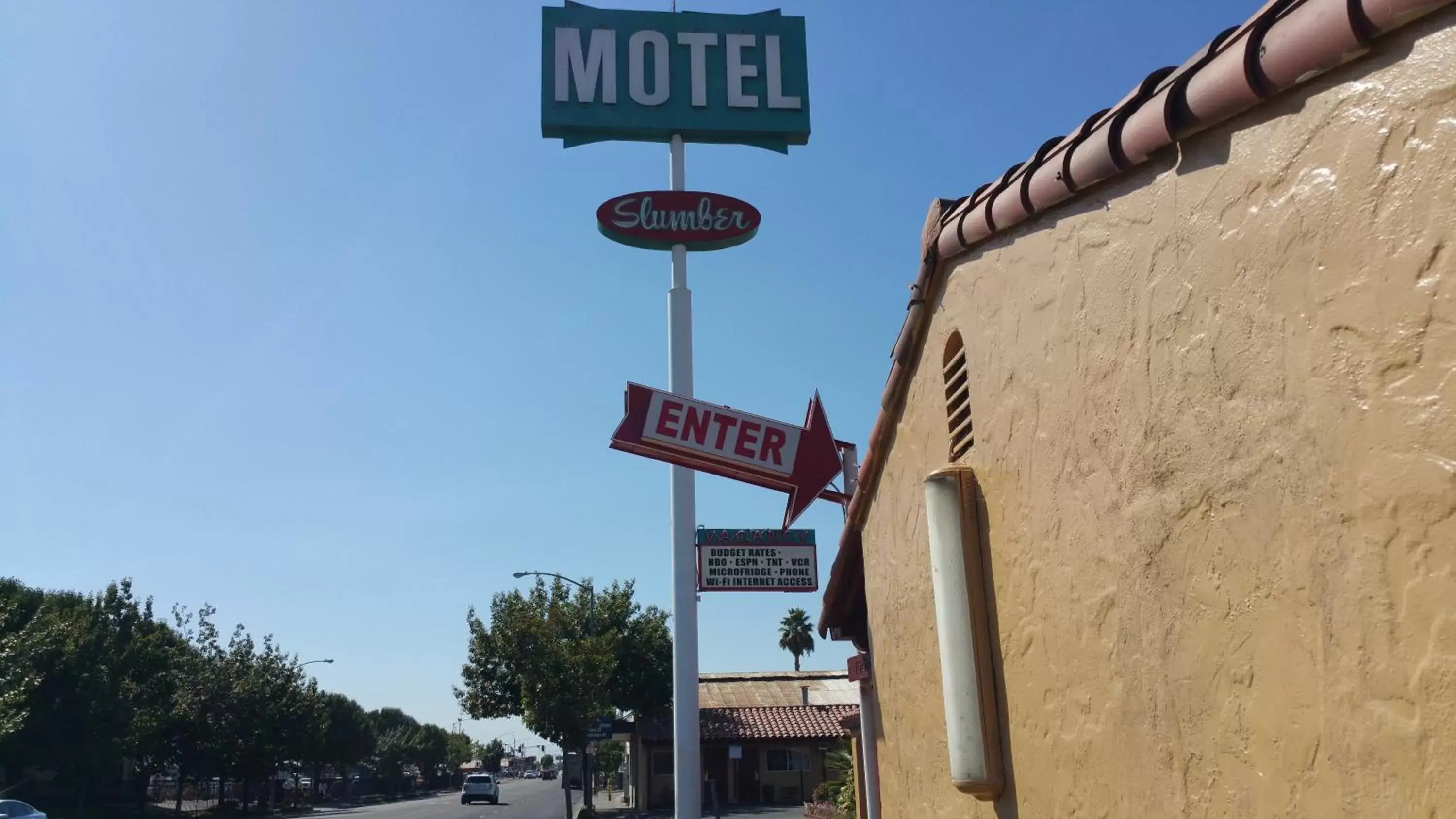 Facade/entrance, Property Logo/Sign in Slumber Motel