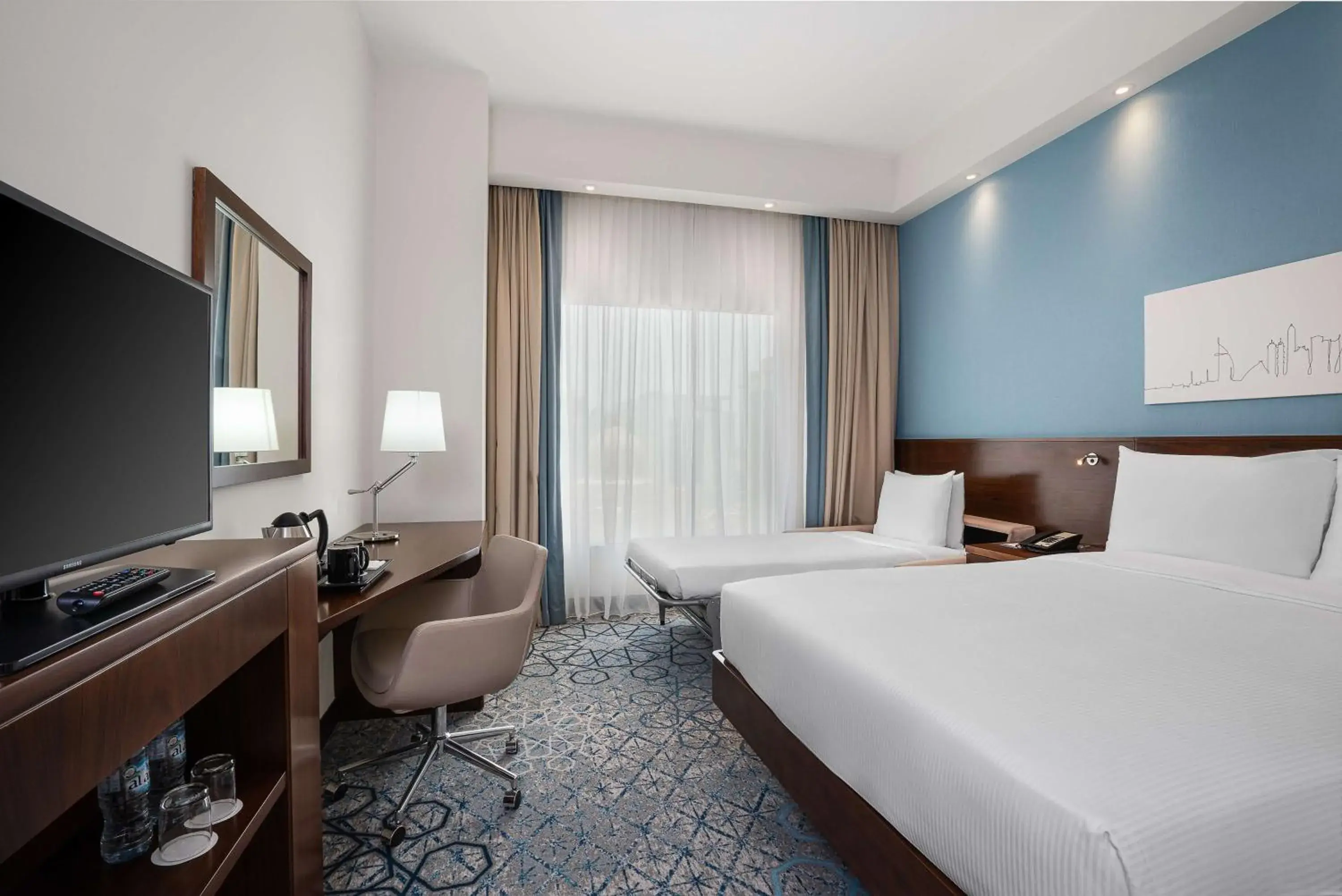 Bed, TV/Entertainment Center in Hampton By Hilton Dubai Al Barsha