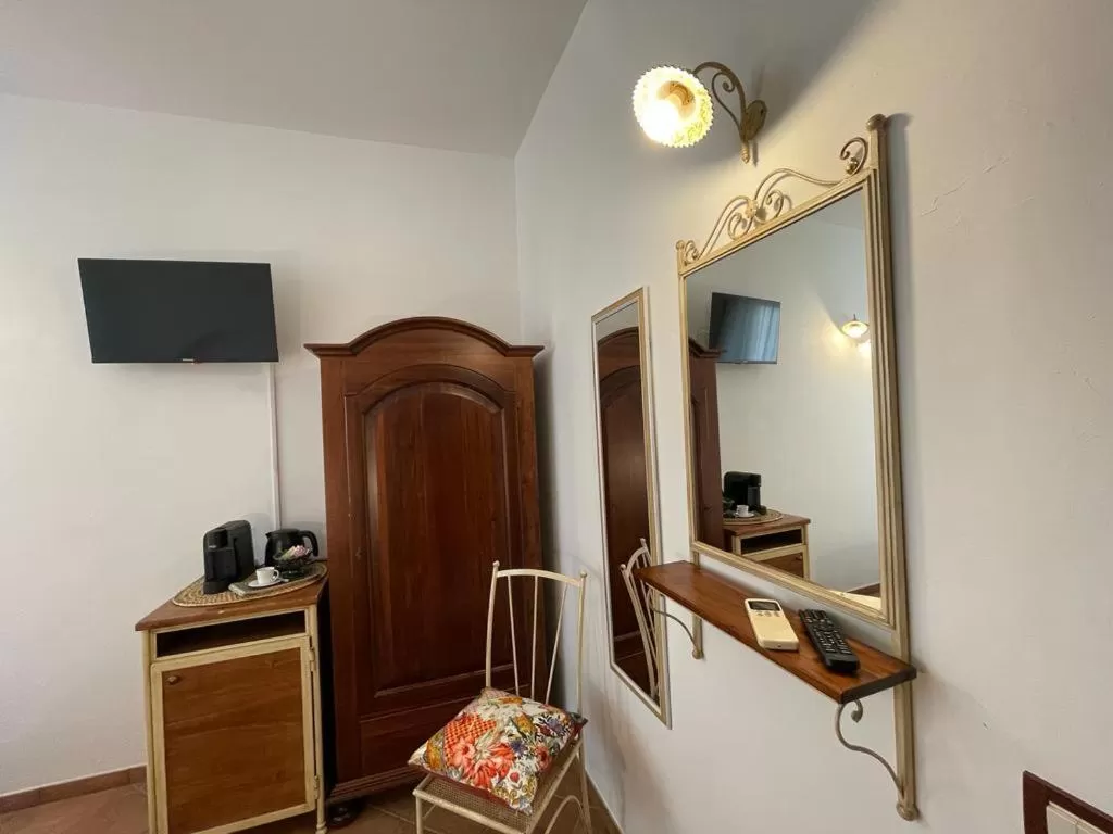 TV/Entertainment Center in Ai Dammusi Rooms