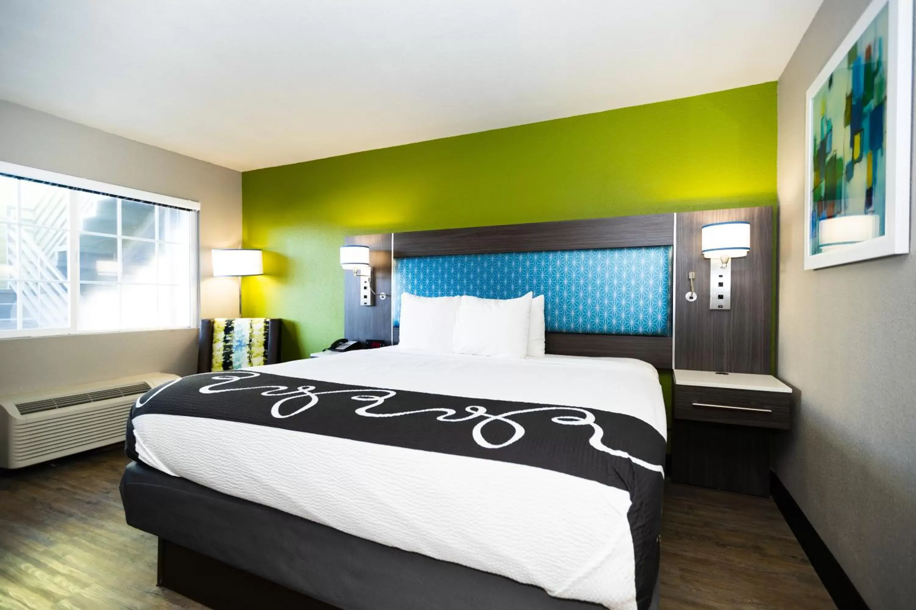 Bed in SureStay Plus Hotel by Best Western Point Richmond