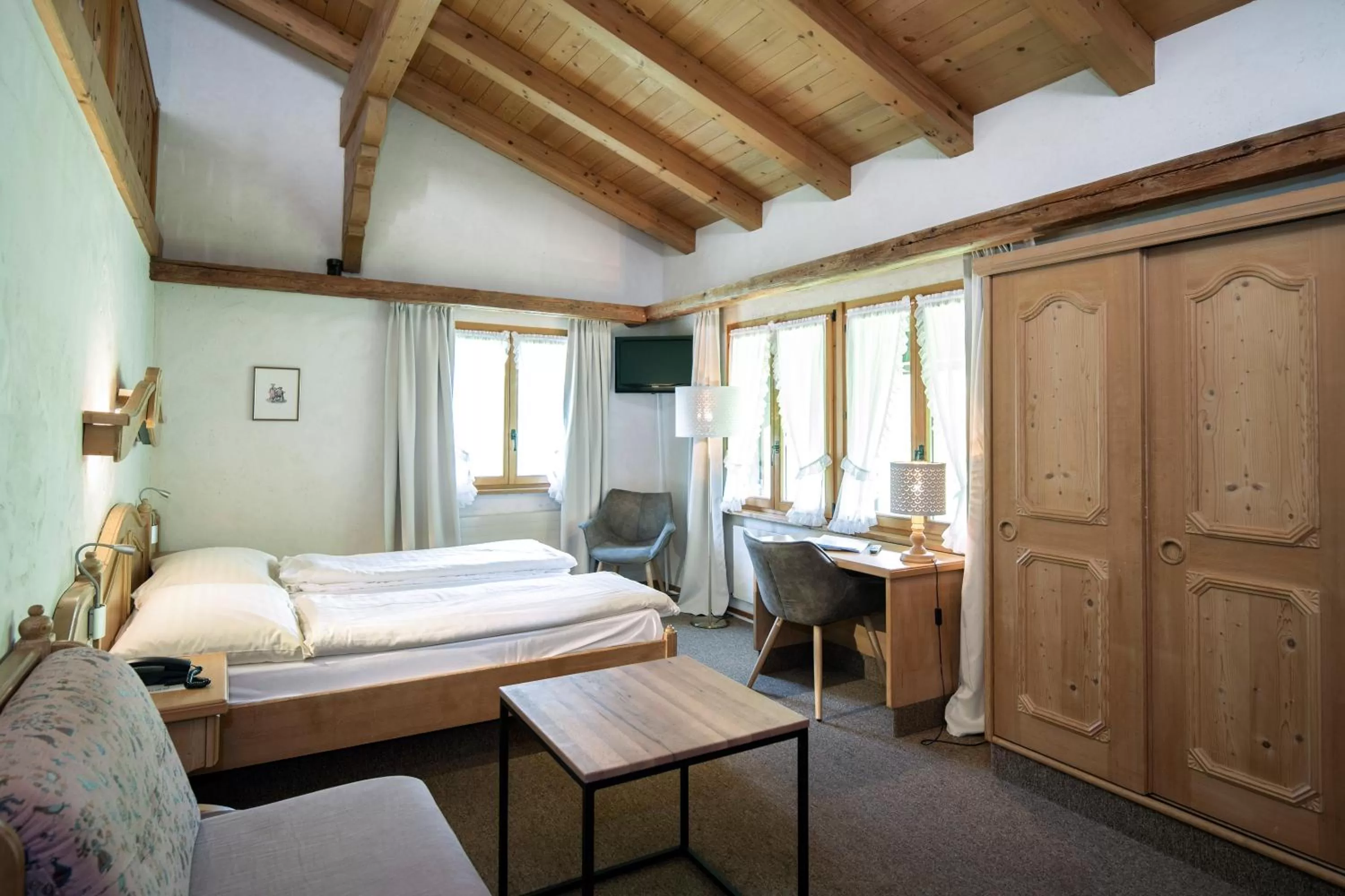 Bed in Hotel Alphorn