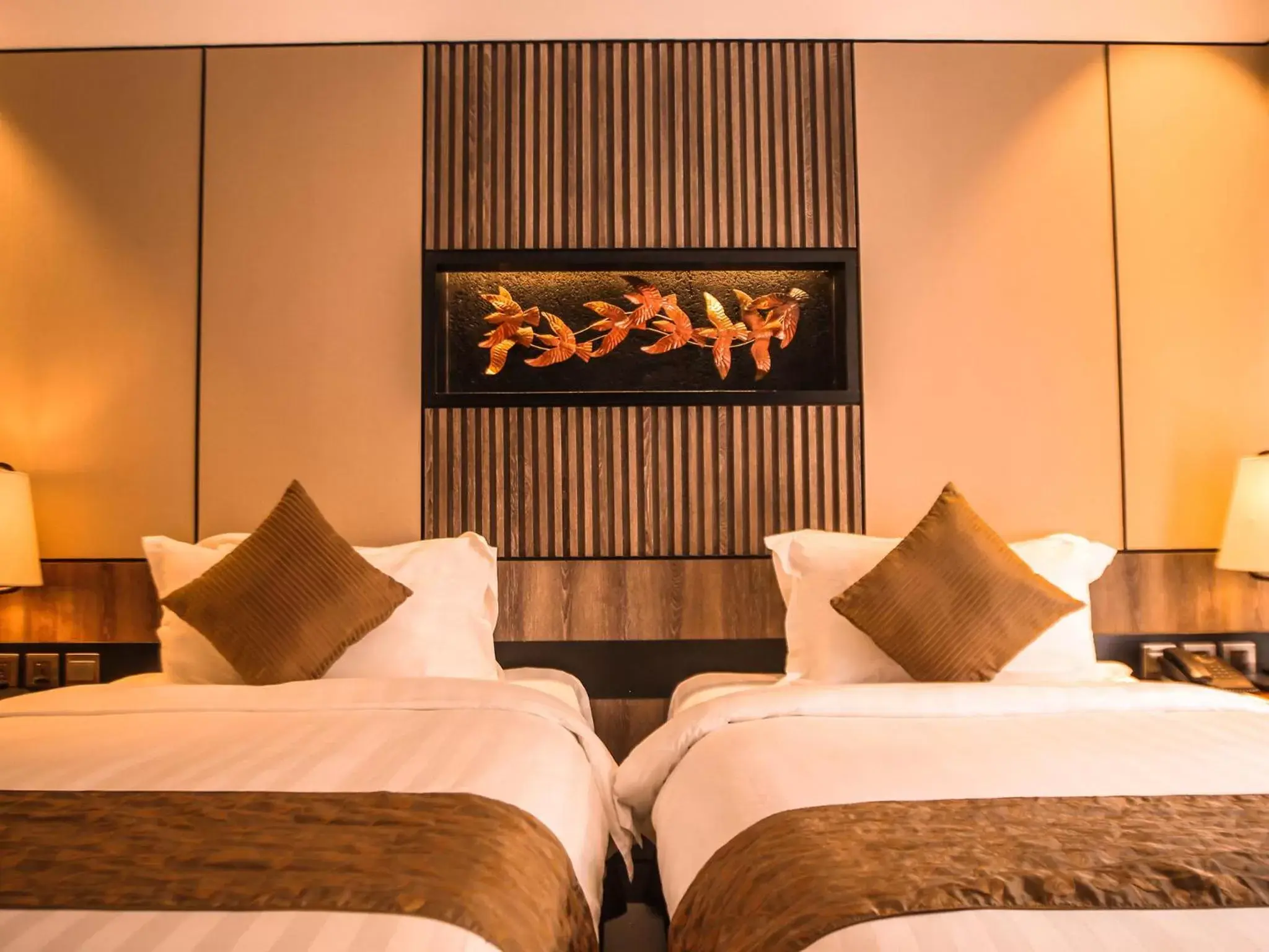 Bed in The Nest Hotel Nusa Dua