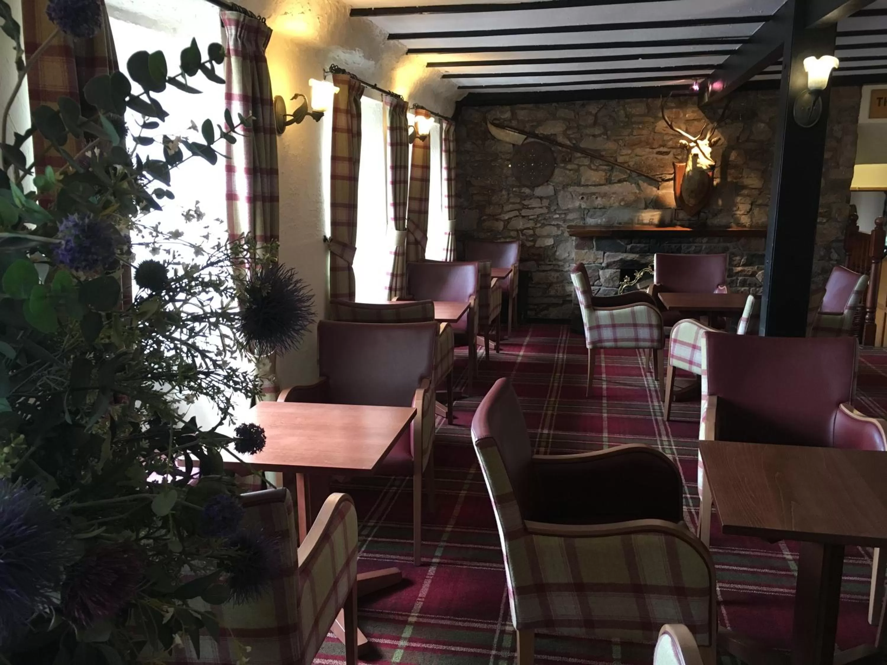 Communal lounge/ TV room in The Winnock Hotel