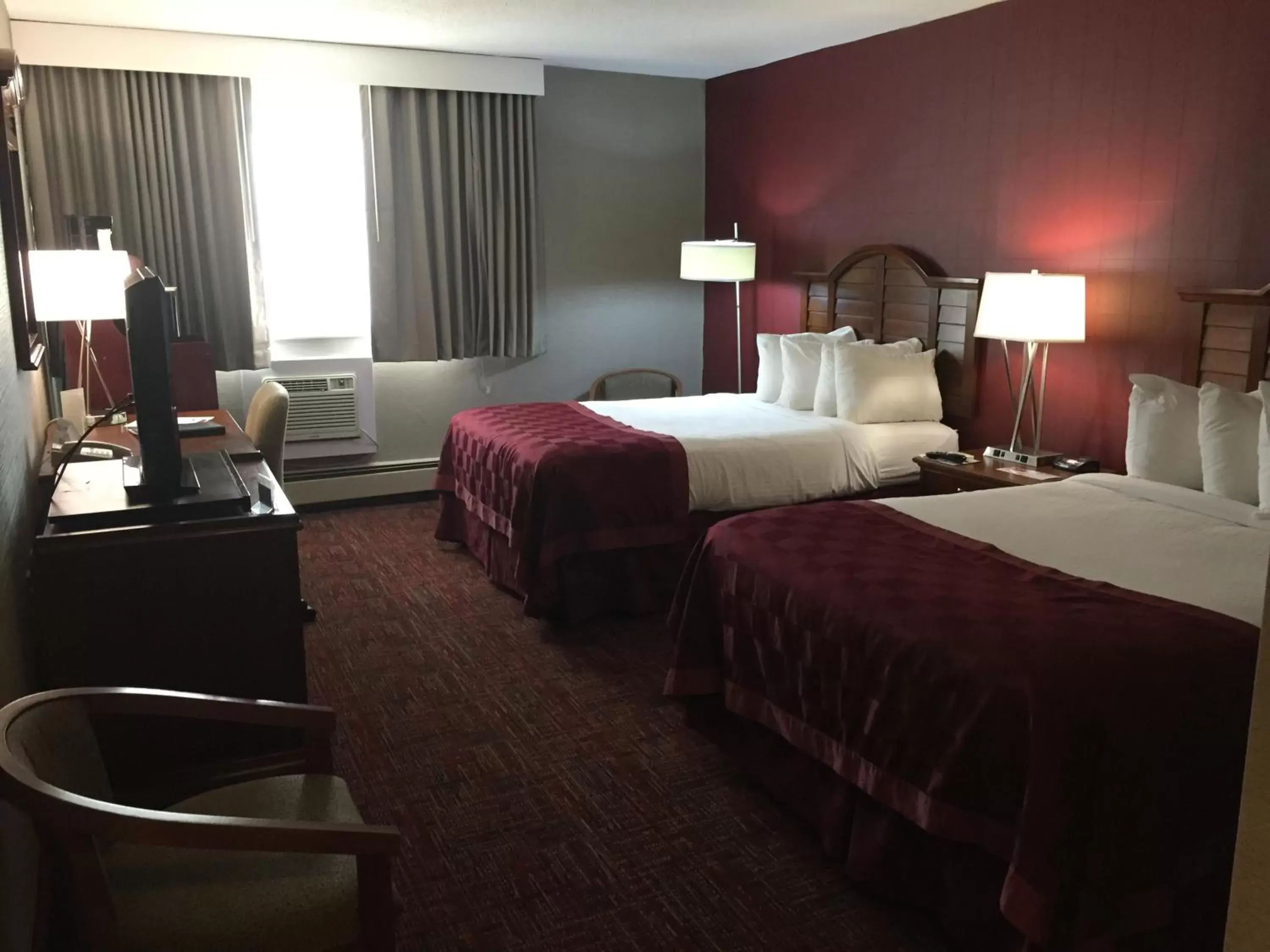 Photo of the whole room, Bed in Ramada by Wyndham Grand Forks