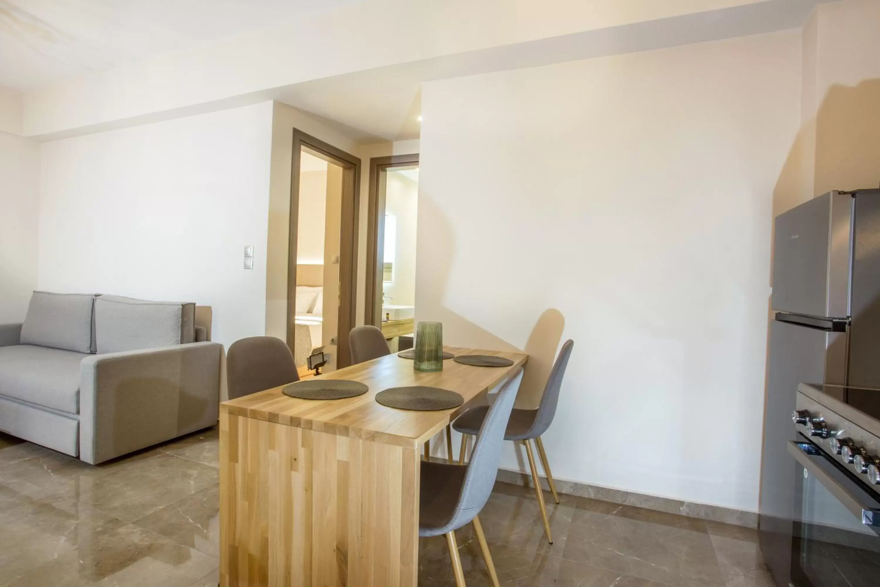 kitchen, Dining Area in Vardians Villas & Suites