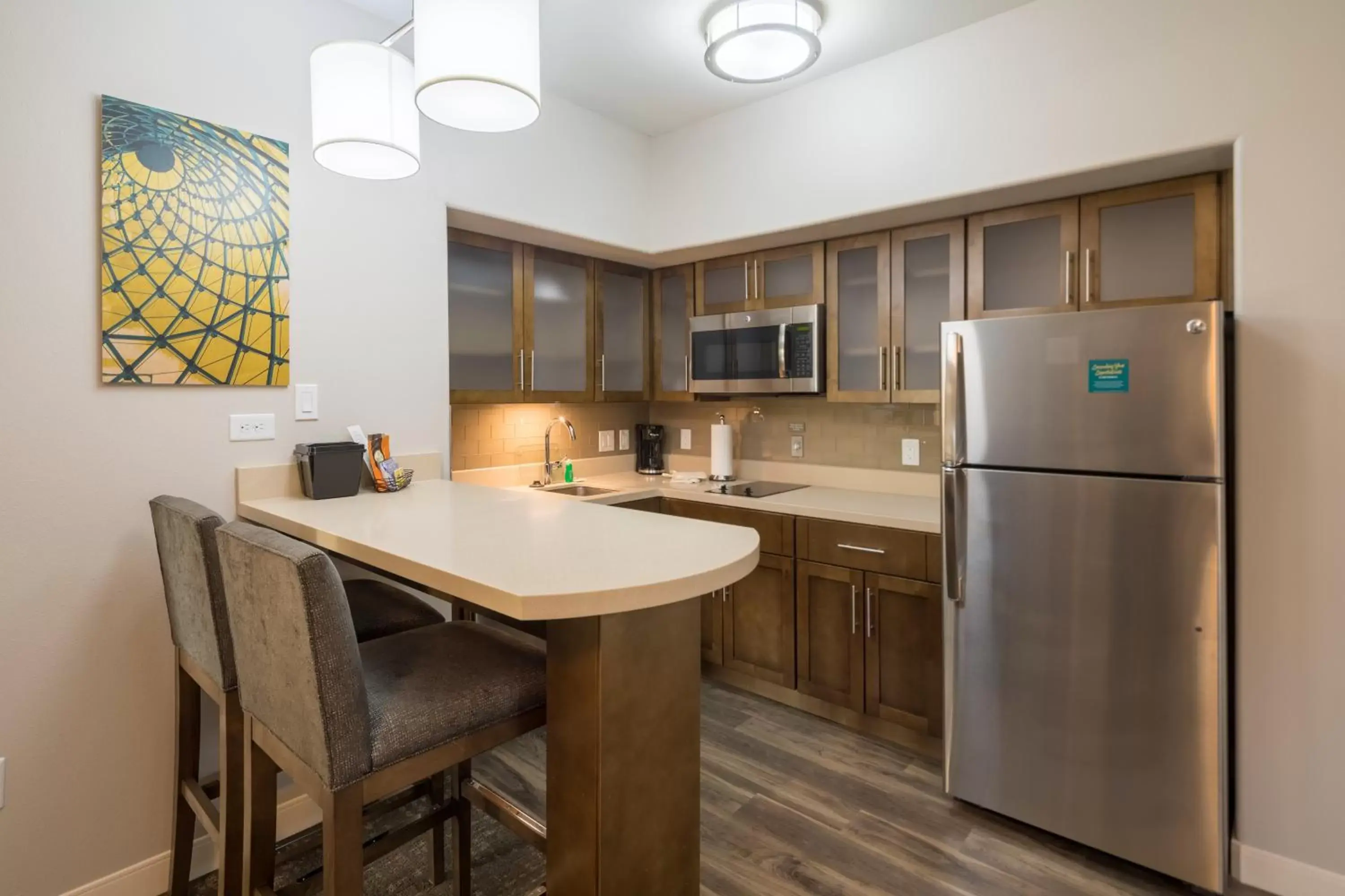 Photo of the whole room, Kitchen/Kitchenette in Staybridge Suites Florence - Cincinnati South, an IHG Hotel