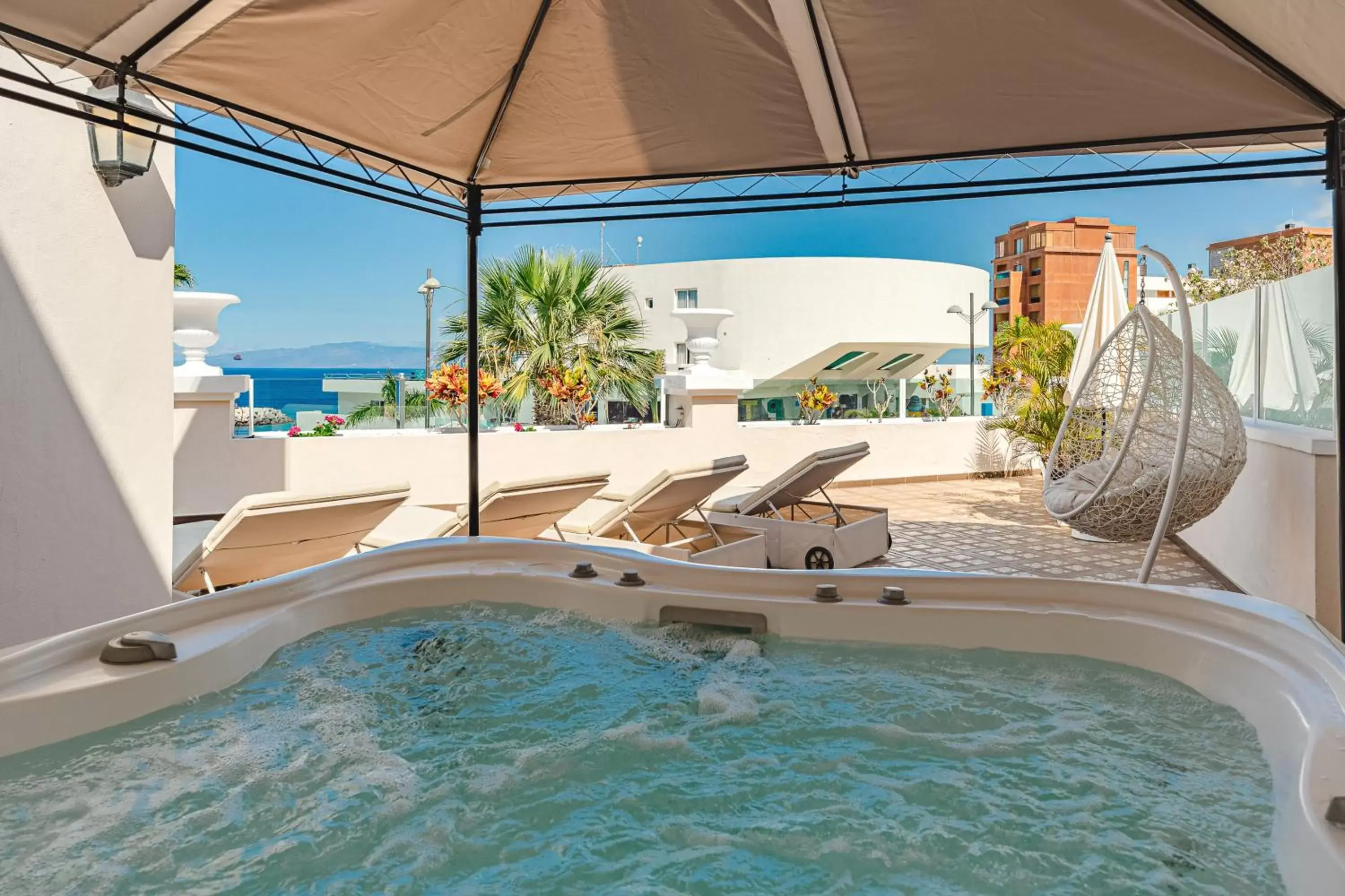 Balcony/Terrace, Swimming Pool in Flamingo Suites Boutique Hotel