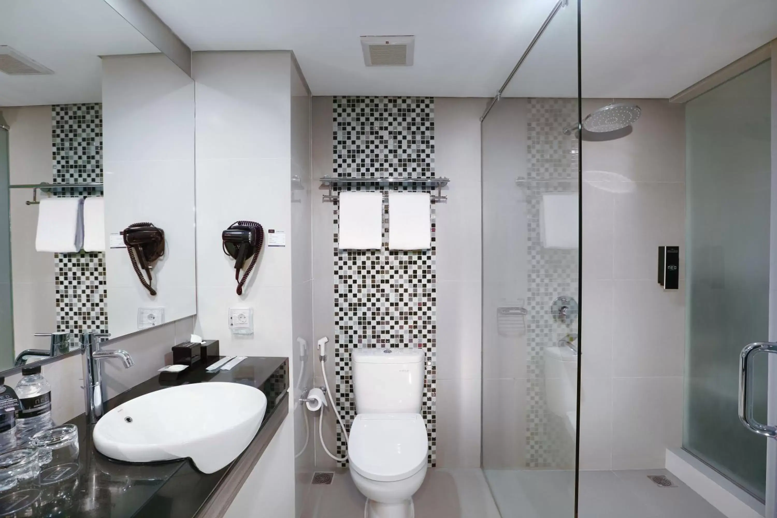 Bathroom in Hotel Neo Malioboro by ASTON