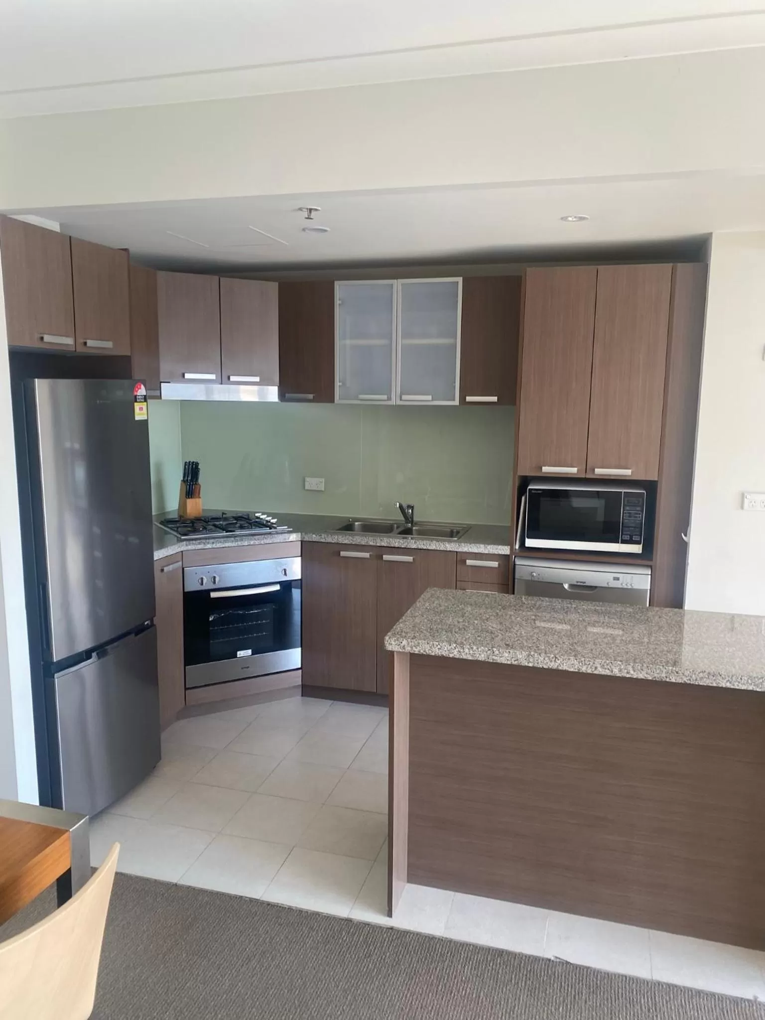 Kitchen or kitchenette in Newcastle Central Plaza Apartment Hotel Official
