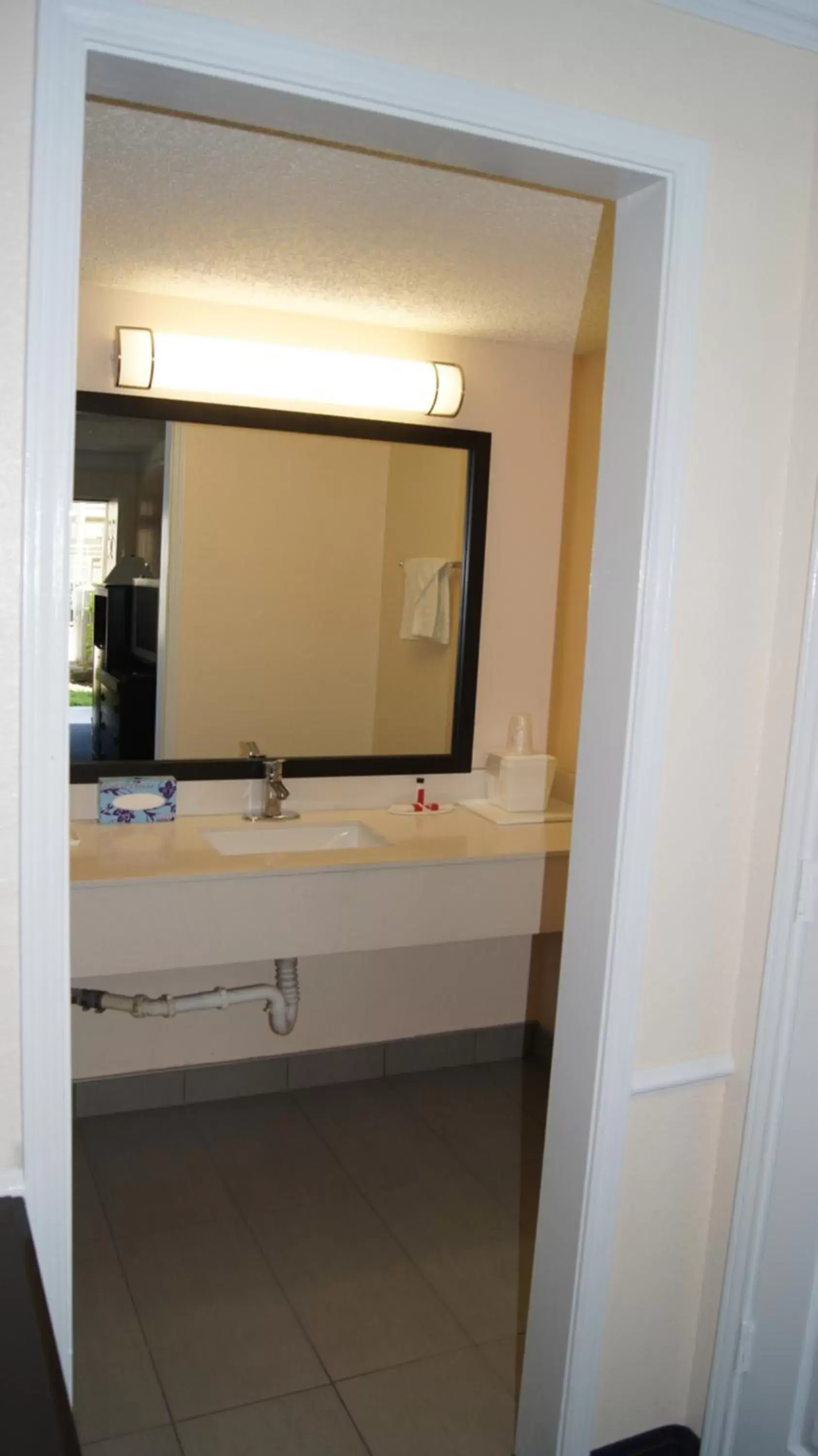 Bathroom in Travelodge by Wyndham North Richland Hills/Dallas/Ft Worth