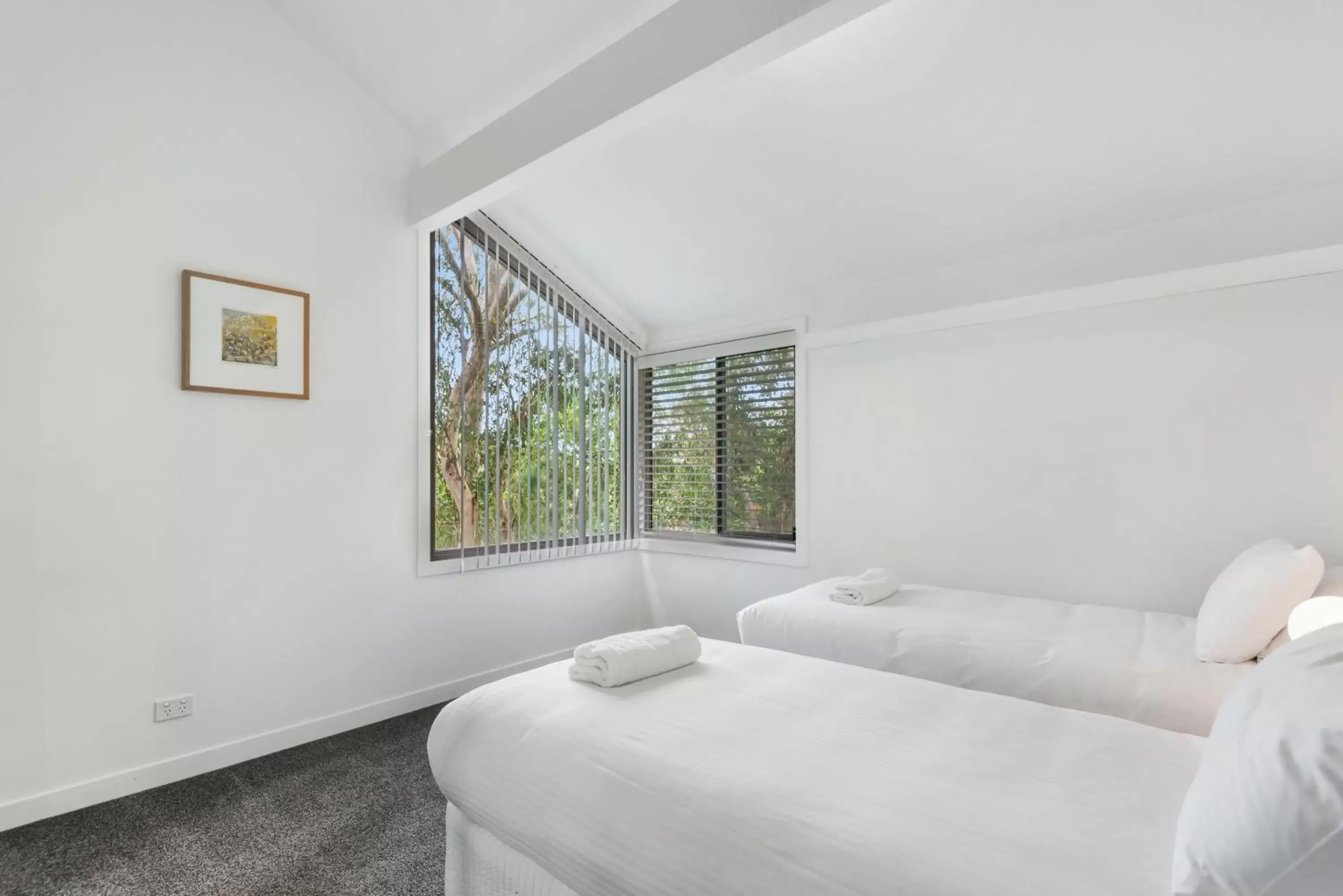 Bedroom, Bed in The Oasis Apartments and Treetop Houses