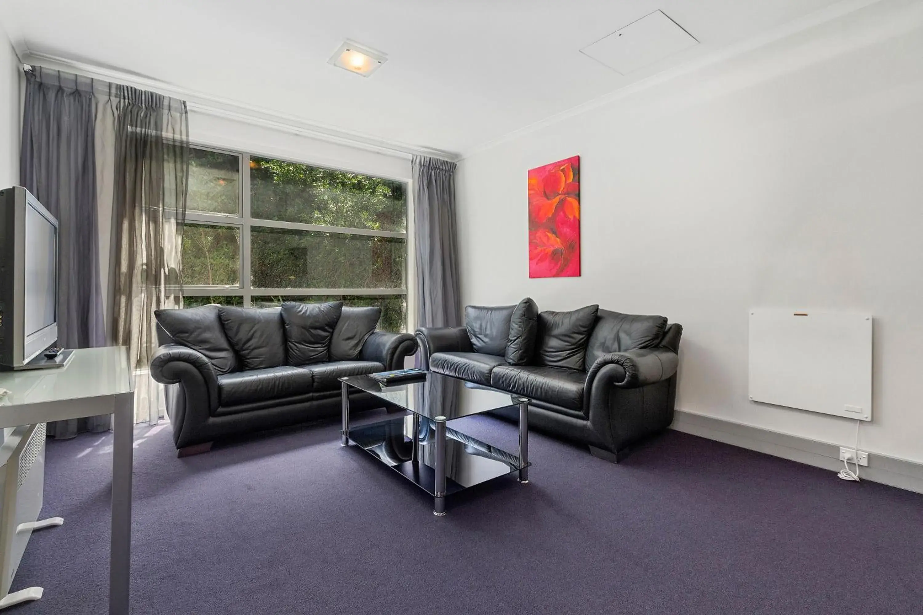 Living room, Seating Area in Amethyst Court Motor Lodge