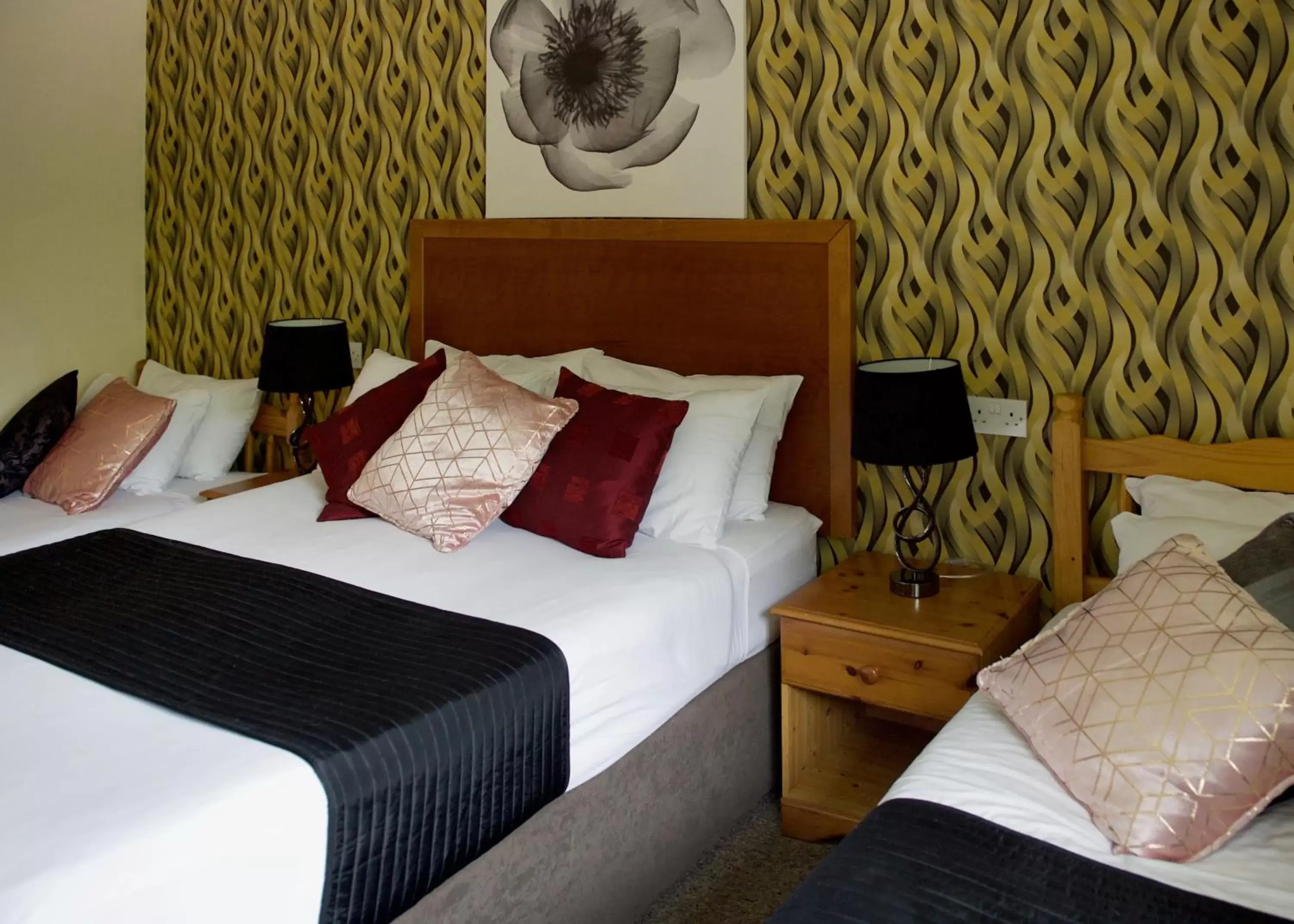 Bed in Little Foxes Hotel & Gatwick Airport Parking