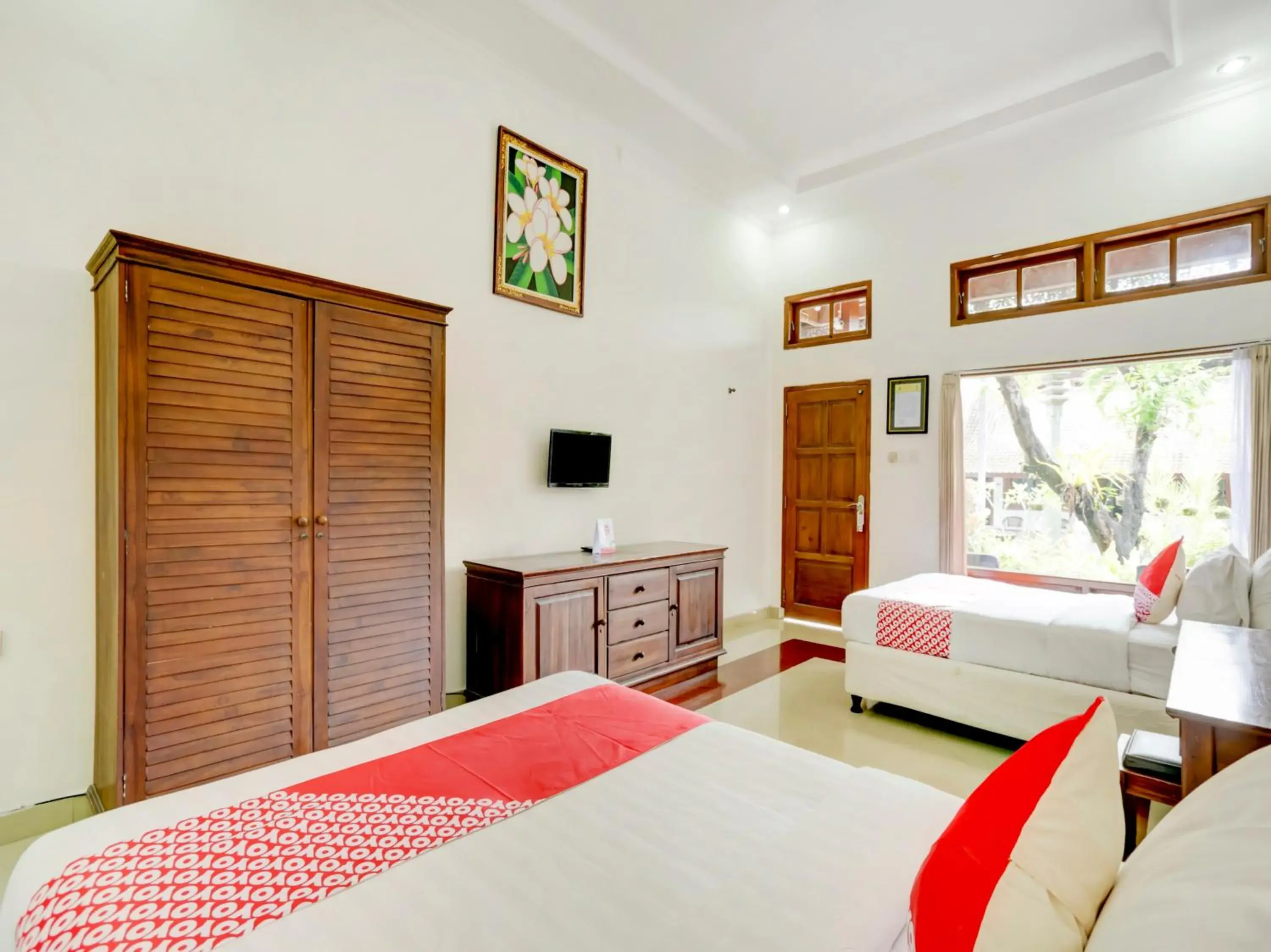 Bedroom in OYO 3261 Hotel Ratu