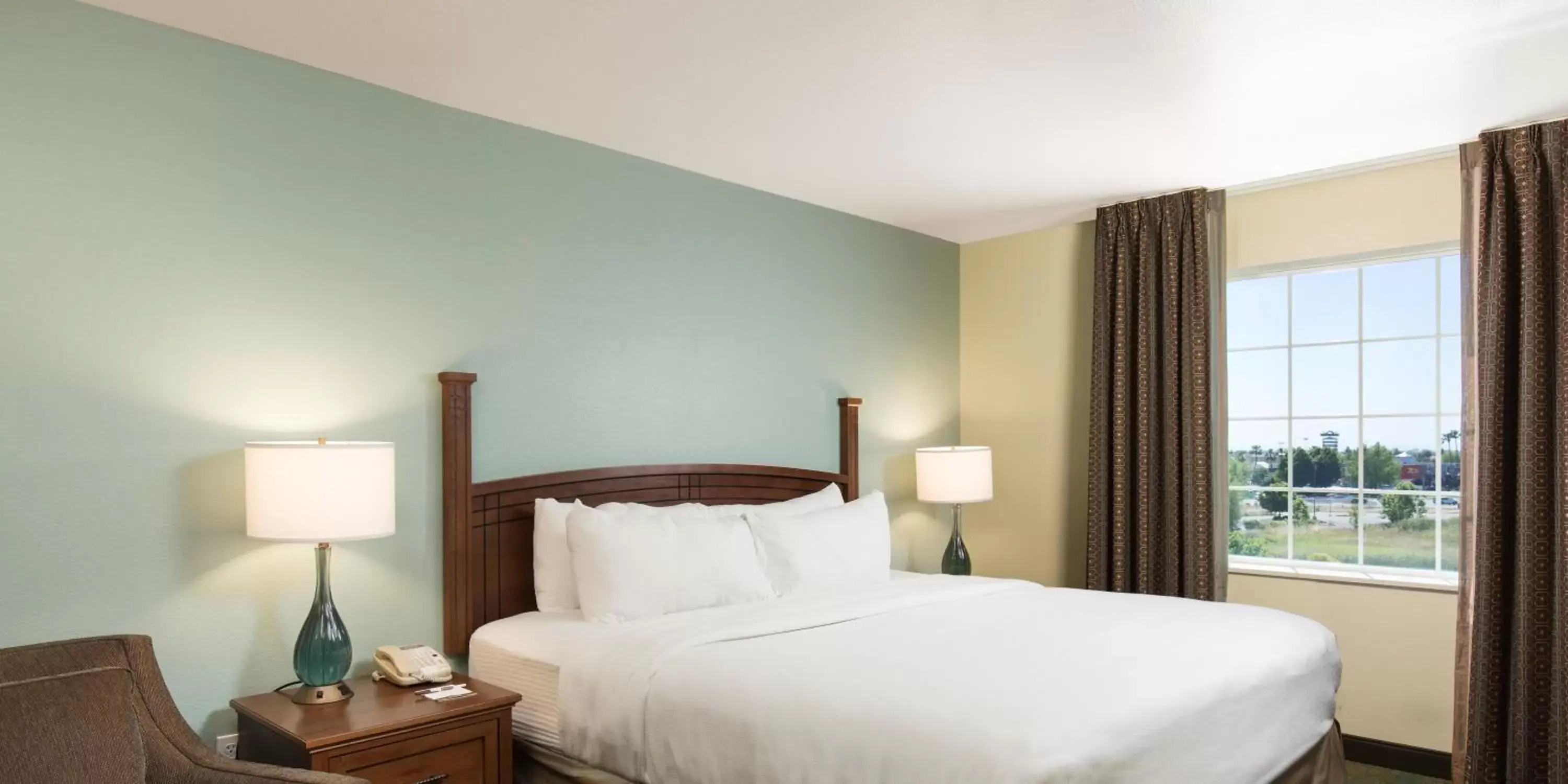 Bed in Staybridge Suites Sacramento-Folsom, an IHG Hotel