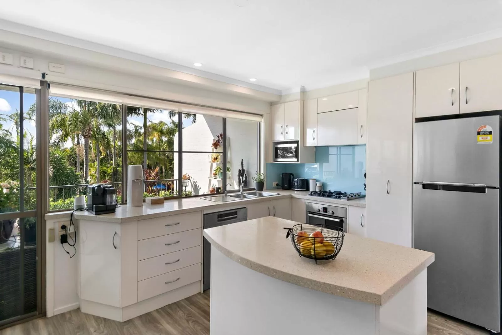 Kitchen or kitchenette in The Oasis Apartments and Treetop Houses