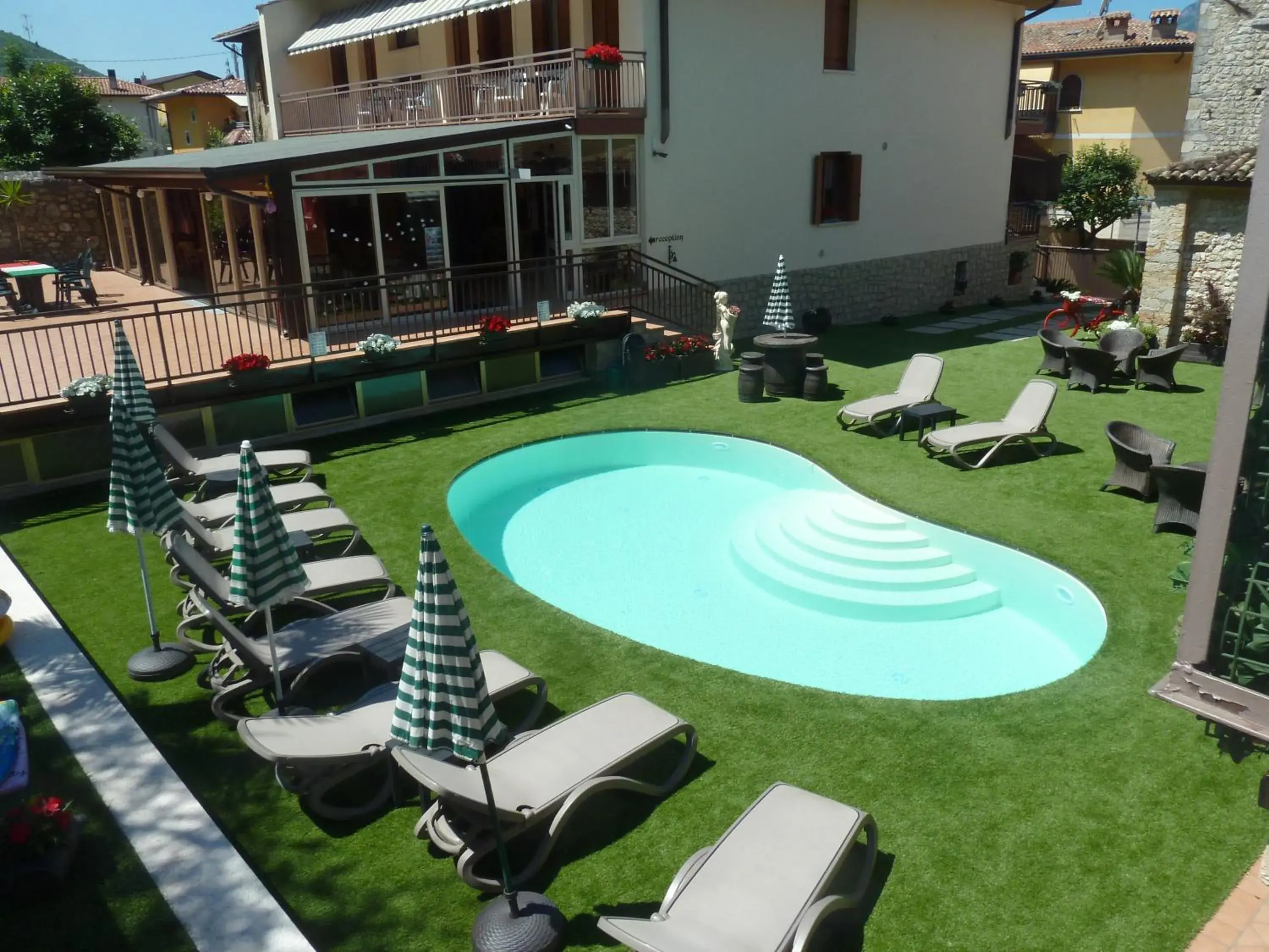 Garden view, Swimming Pool in Albergo Casa Este