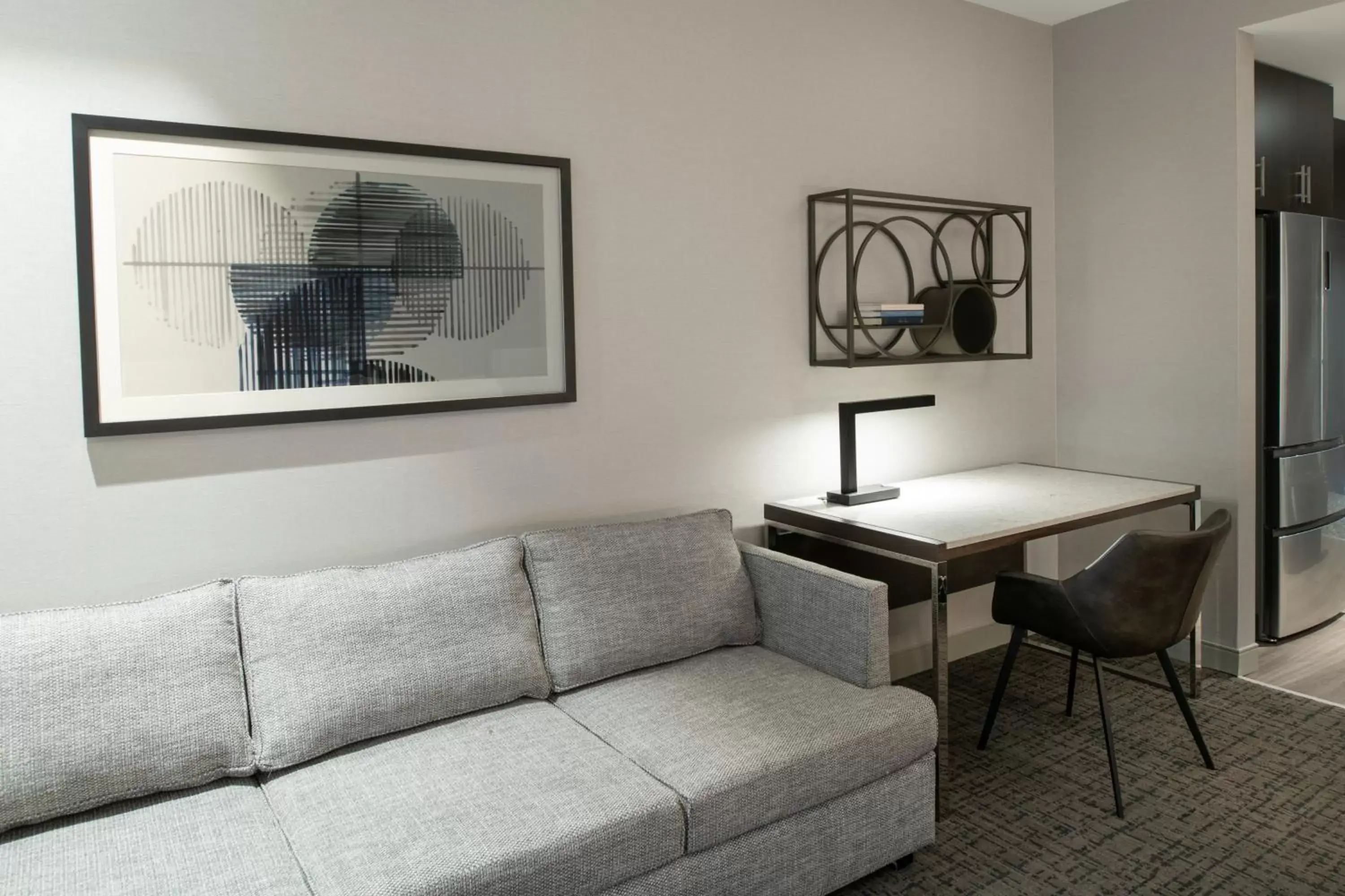 Photo of the whole room, Seating Area in Staybridge Suites - Quincy, an IHG Hotel