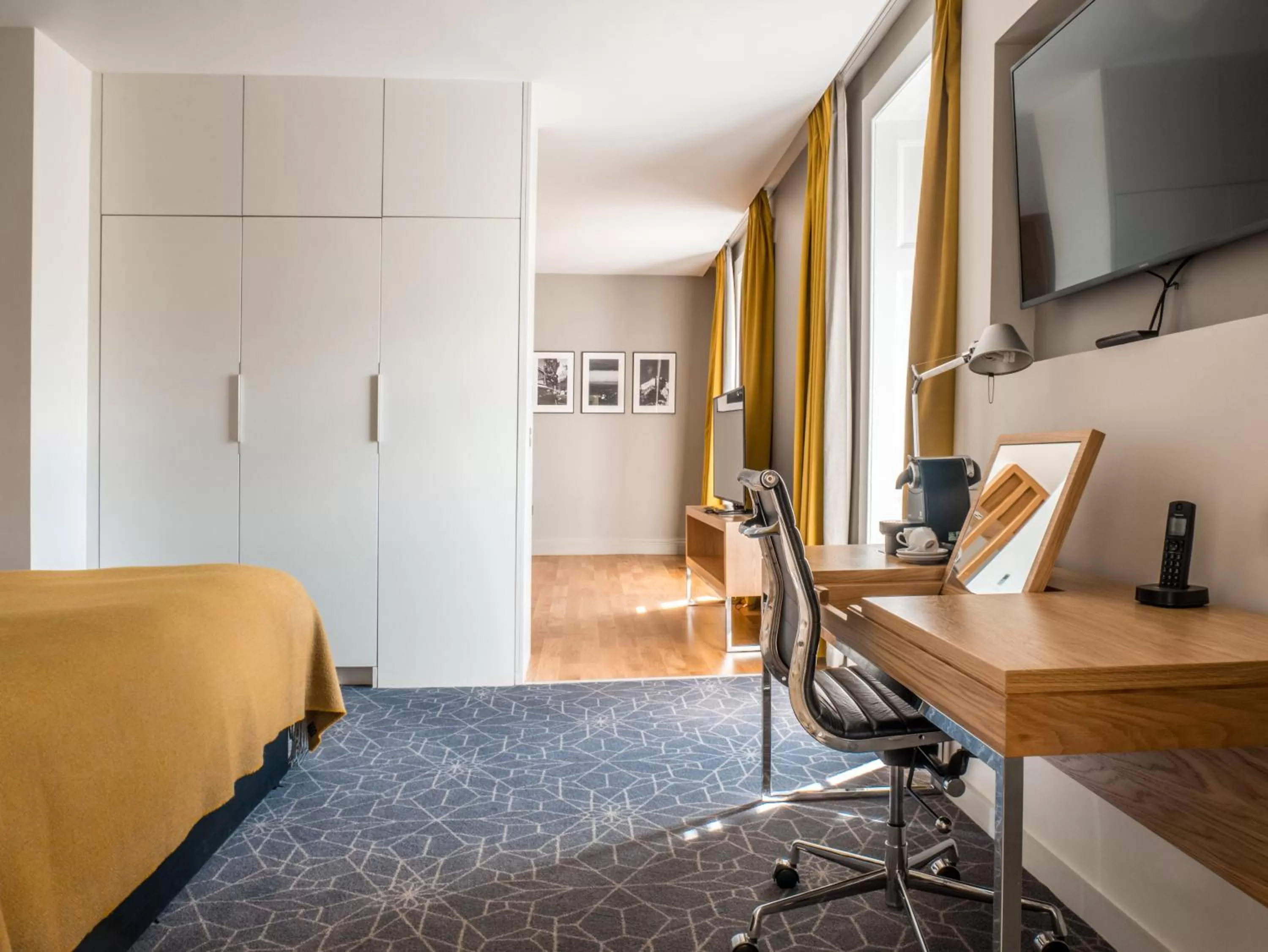 Communal lounge/ TV room in Apex Waterloo Place Hotel