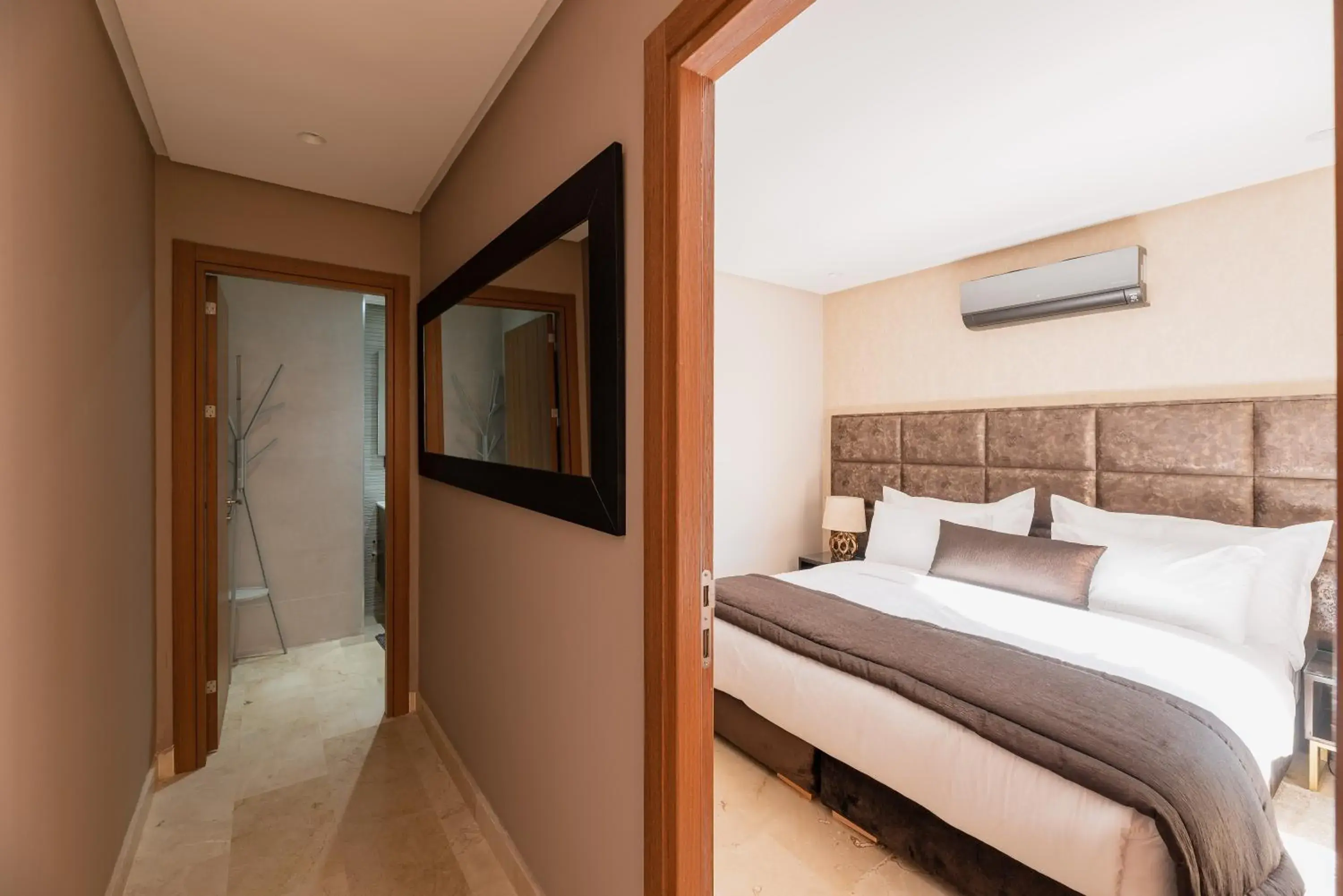 Bed in Avenue Suites & Appart Hotel Deluxe