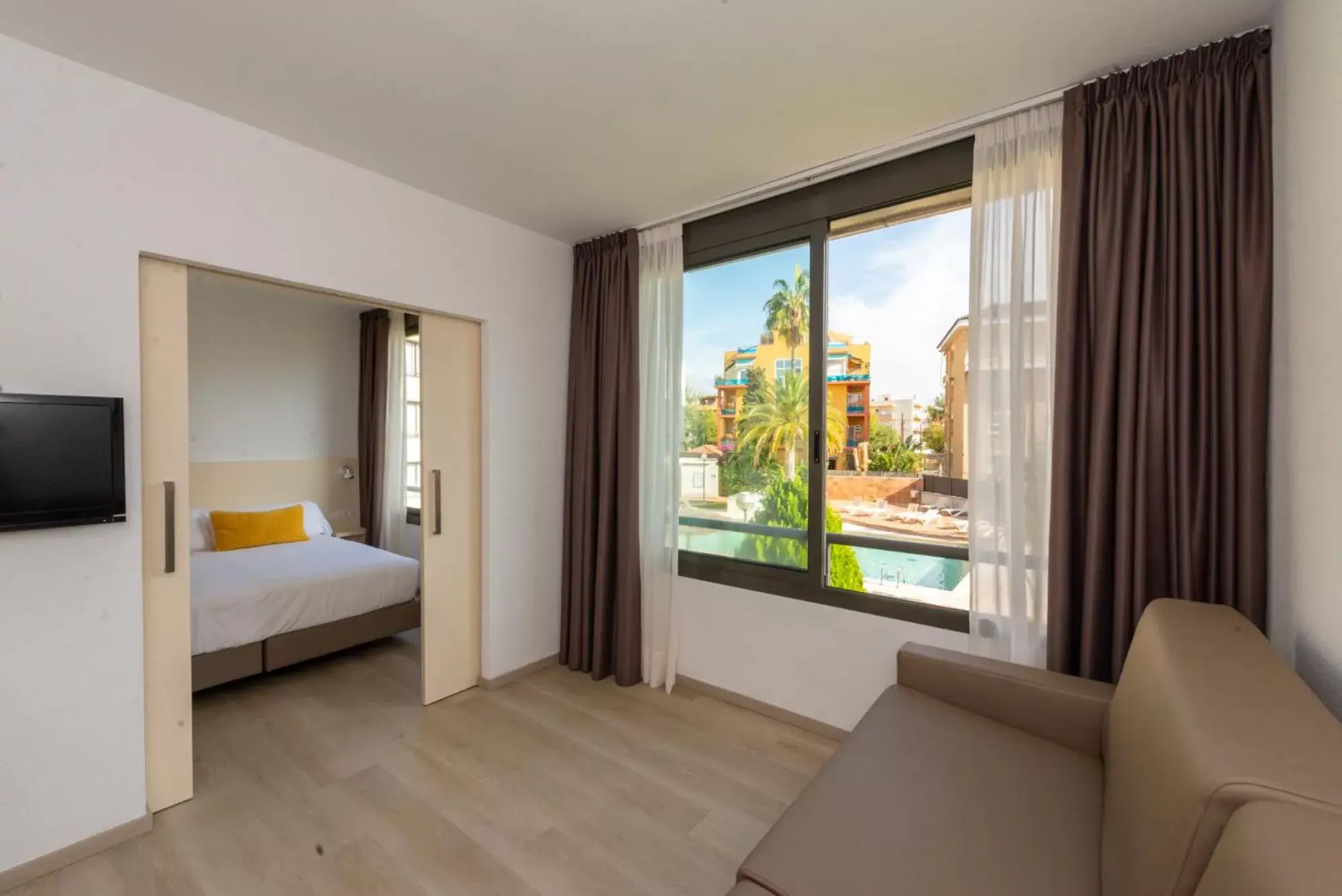 Bed in Atenea Park Suites & Apartments