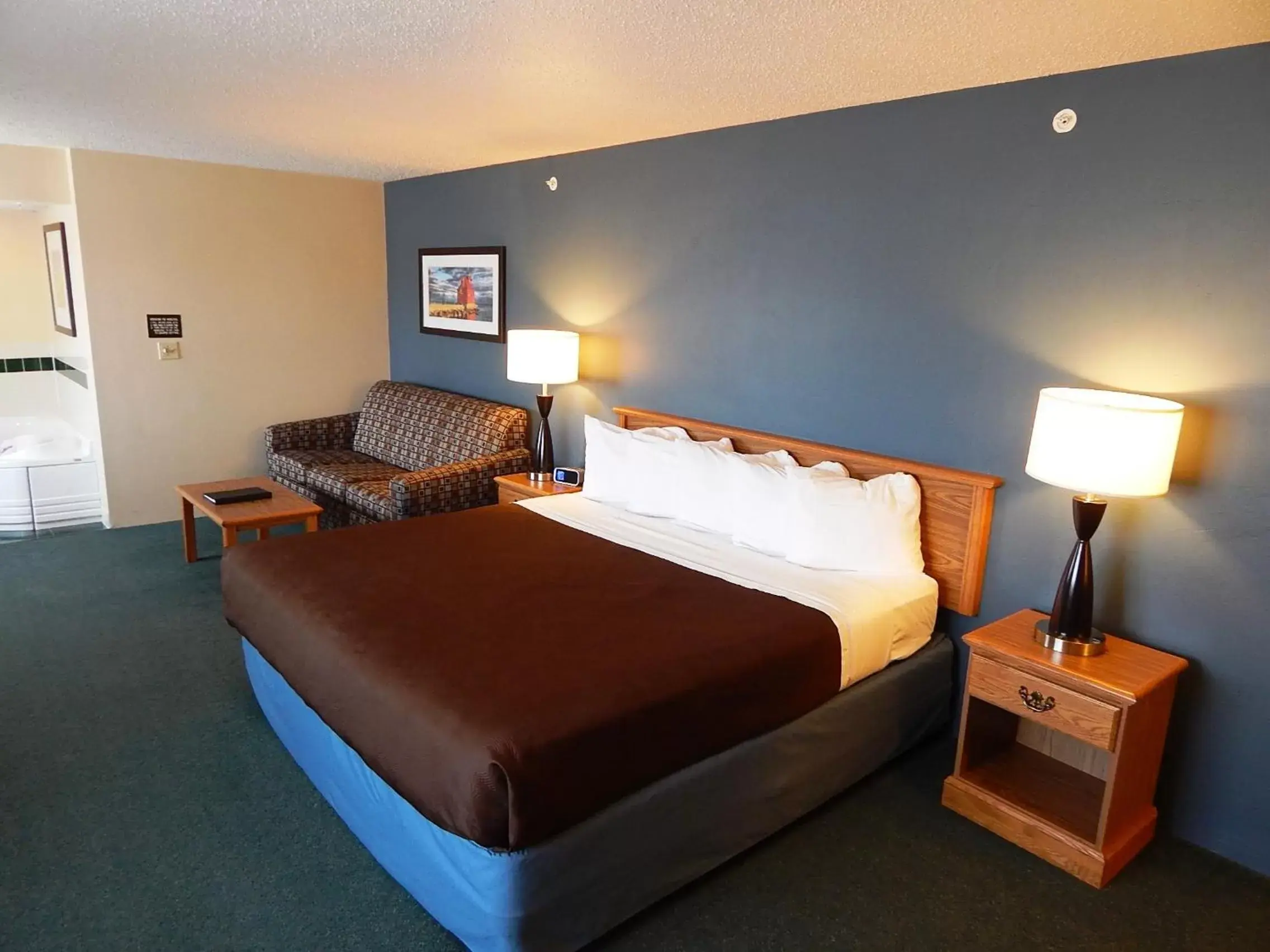 Bed in AmericInn by Wyndham Sturgeon Bay