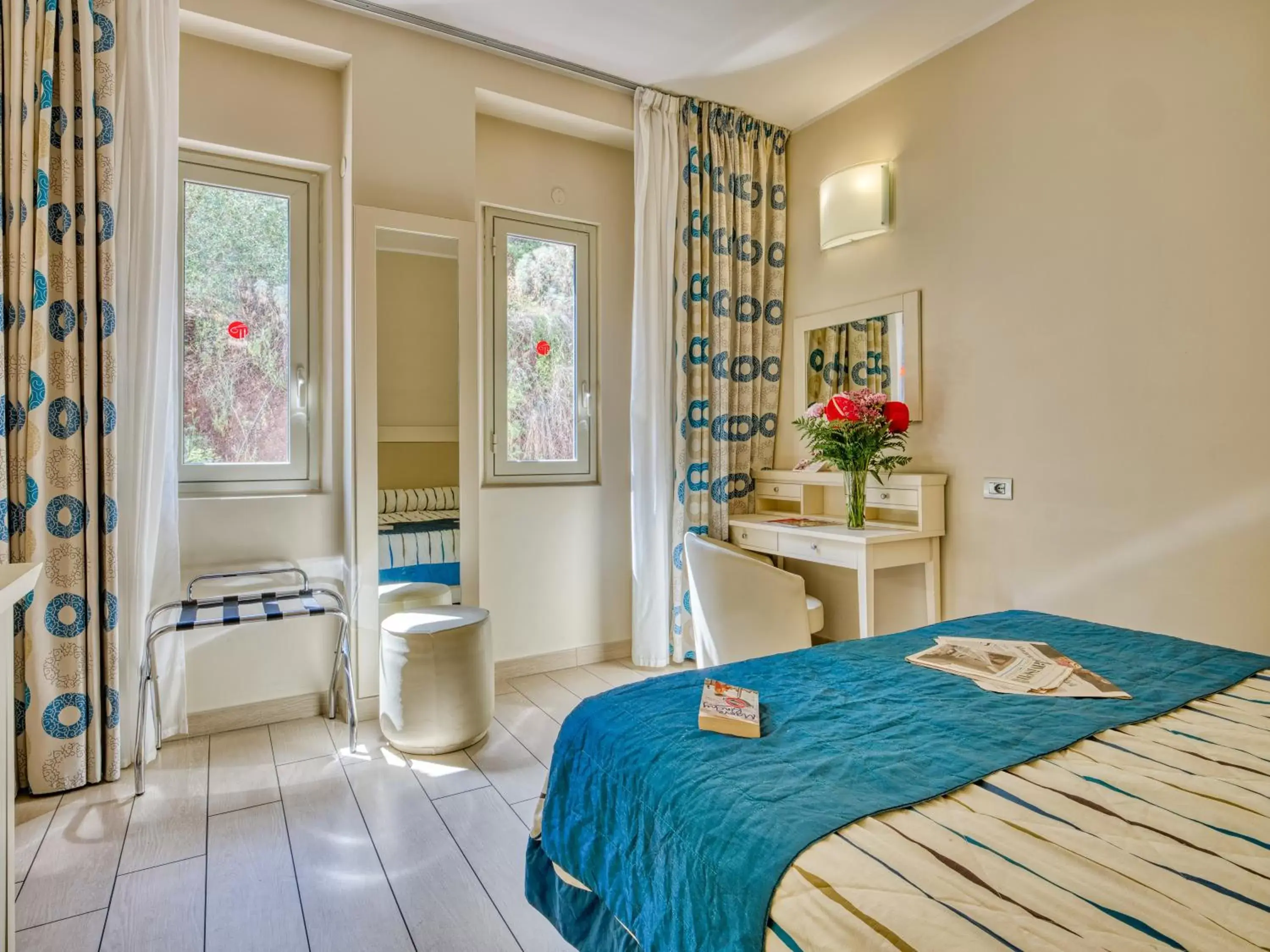 Bedroom in Hotel Ariston and Palazzo Santa Caterina