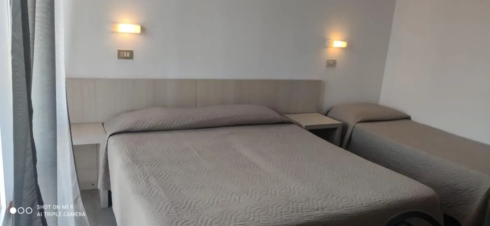 Bed in Hotel Orlov Rimini