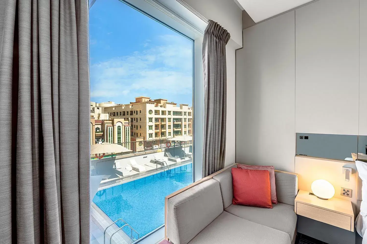 Bedroom, Pool View in Studio M Arabian Plaza Hotel & Hotel Apartments