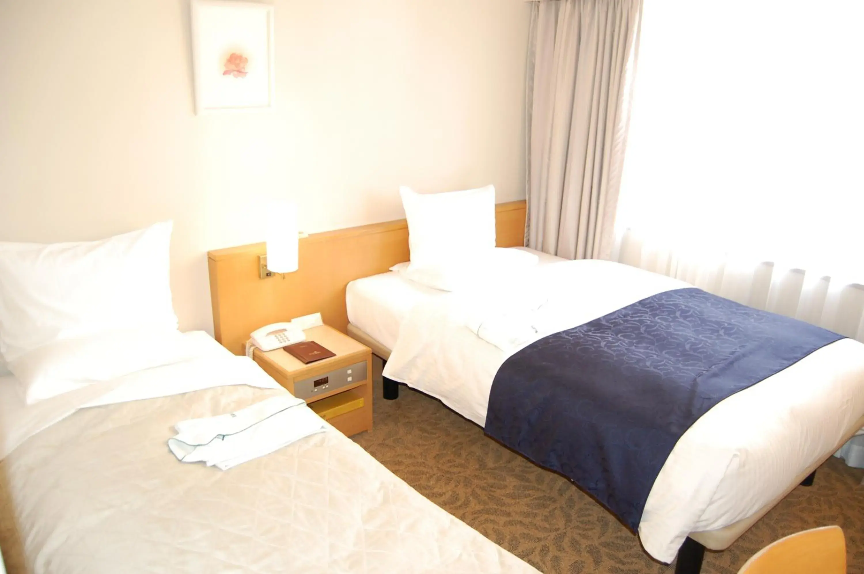 Photo of the whole room, Bed in Hotel Rose Garden Shinjuku