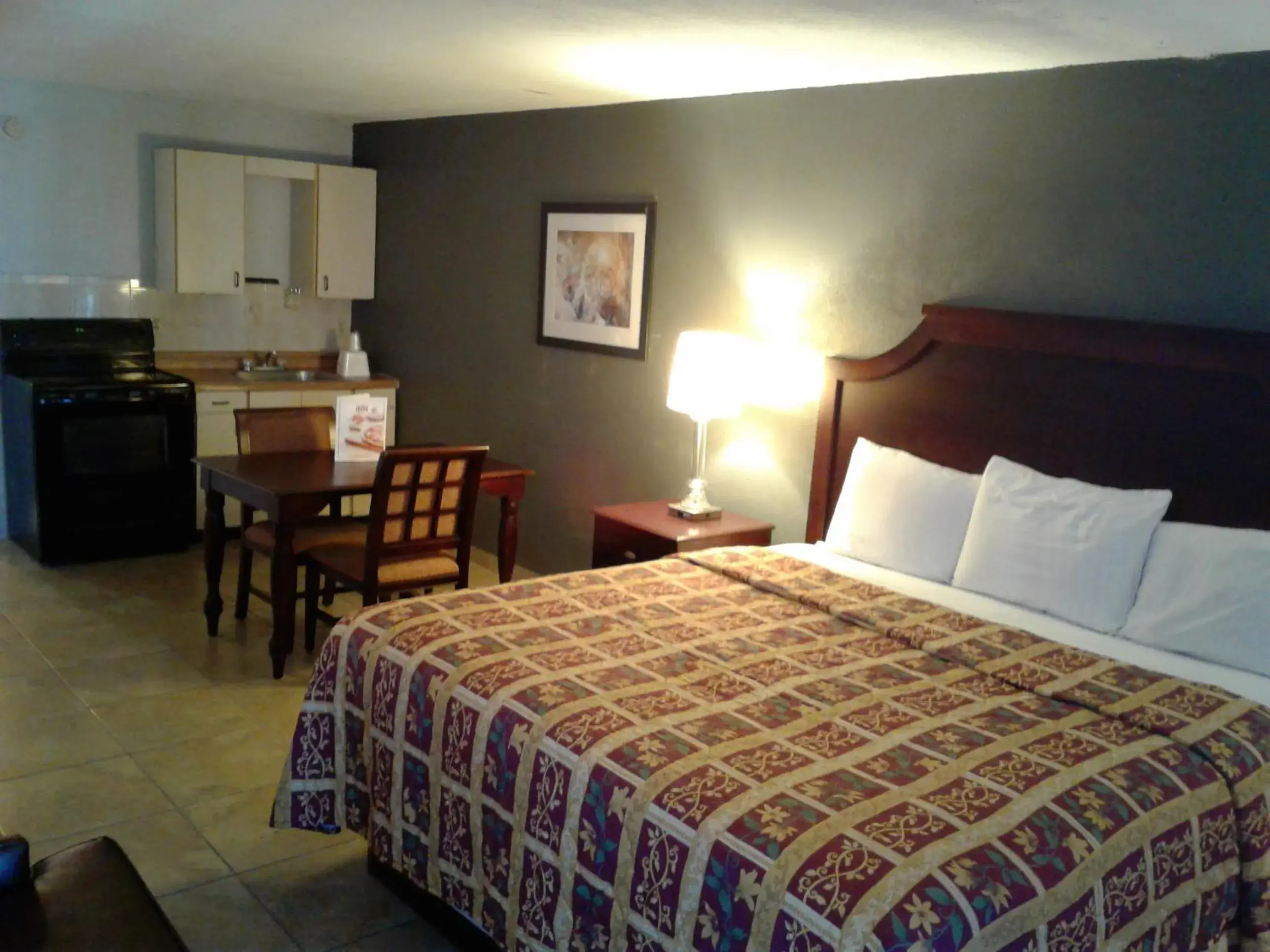 Bed in Express Inn & Suites - 5 Miles from St Petersburg Clearwater Airport