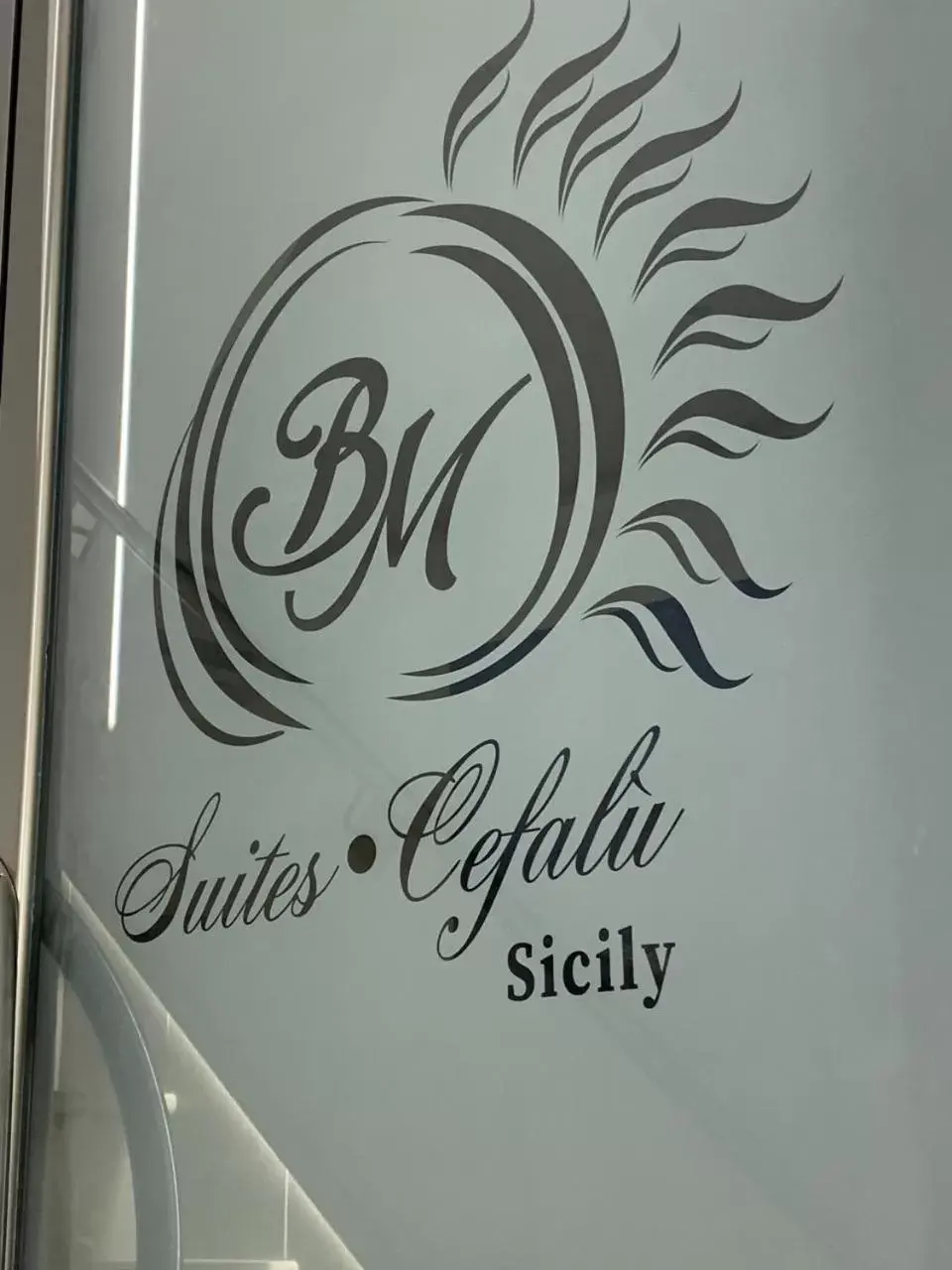 Property logo or sign in BM SUITES CEFALU