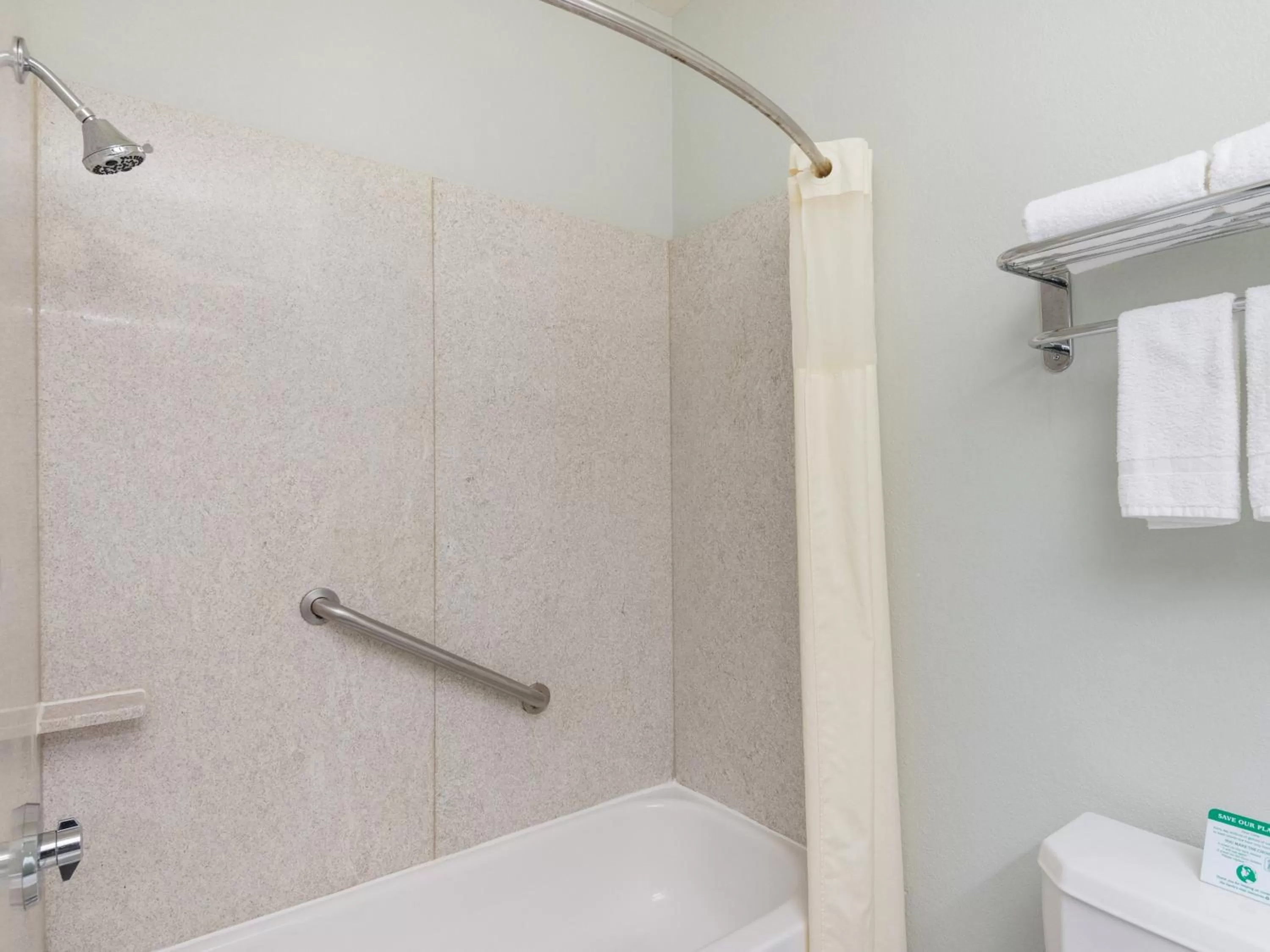 Bathroom in Baymont by Wyndham Houston Brookhollow