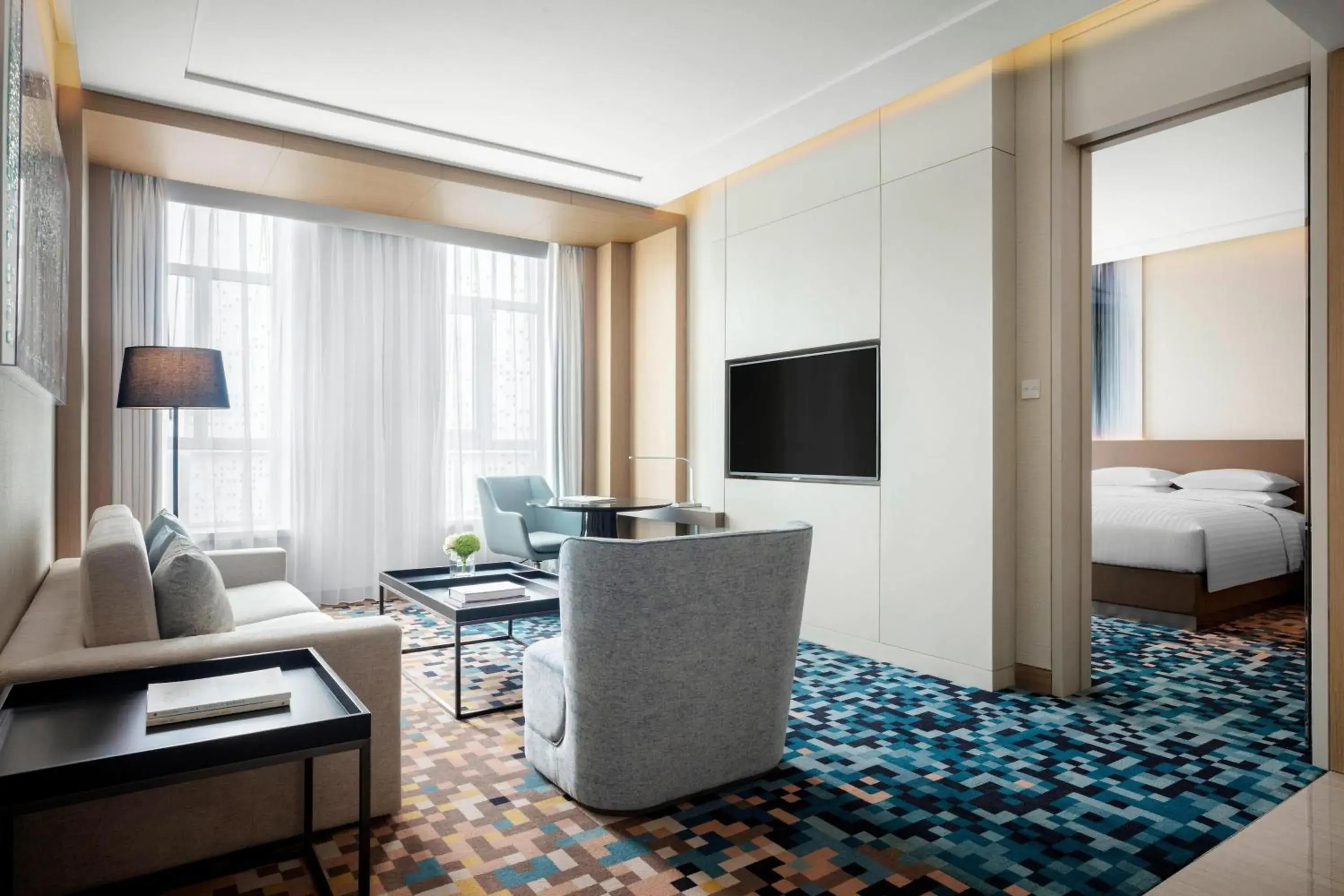 Living room, TV/Entertainment Center in Courtyard by Marriott Shanghai Minhang