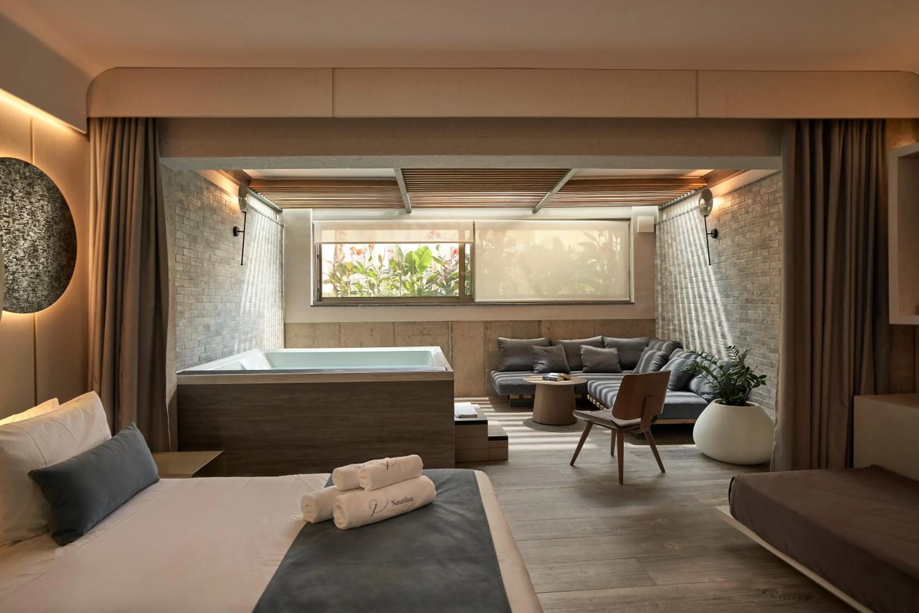 Living room, Bed in Nautilux Rethymno by Mage Hotels
