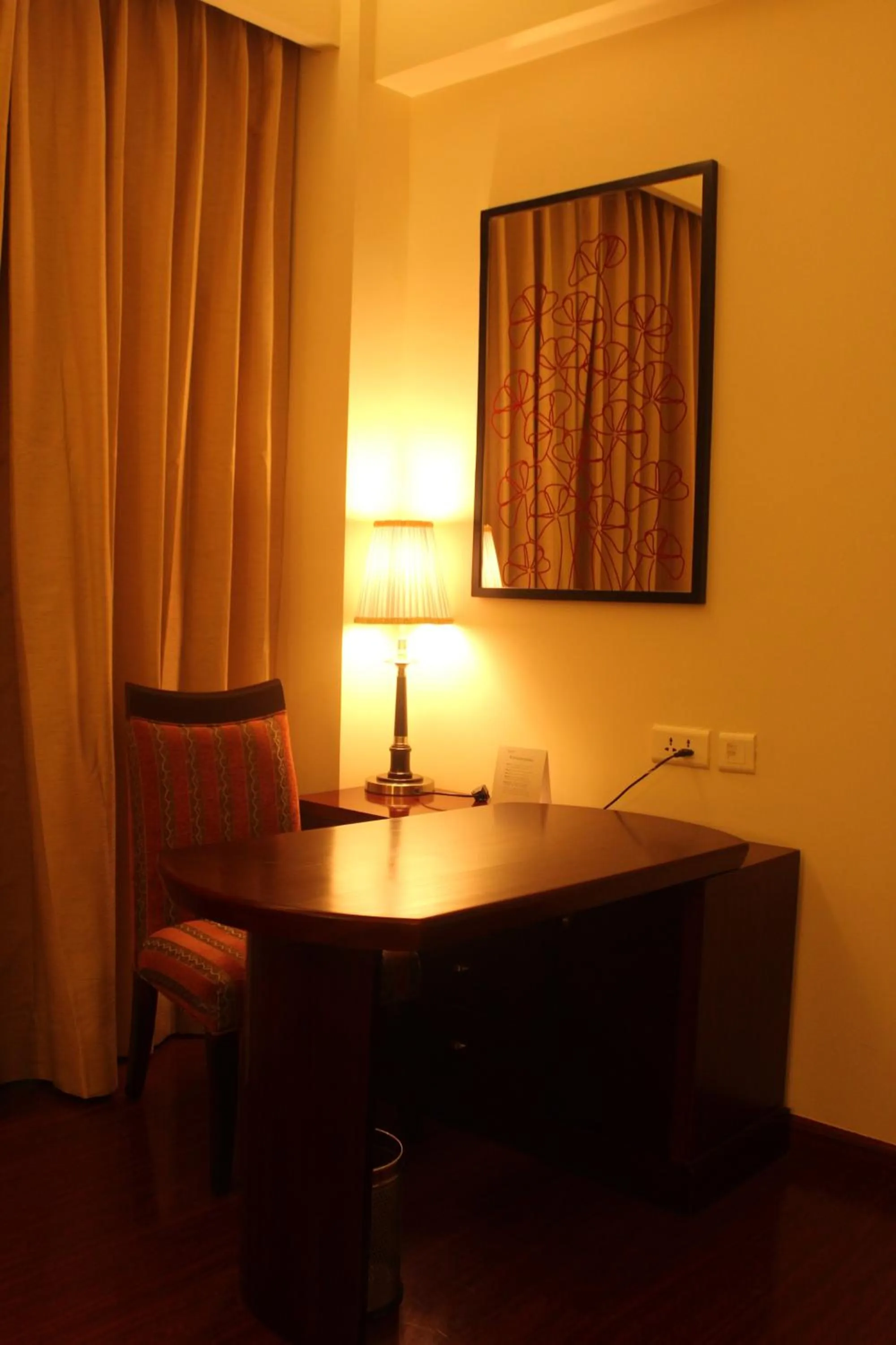 Seating area in Ramada by Wyndham Jaipur Jaisinghpura