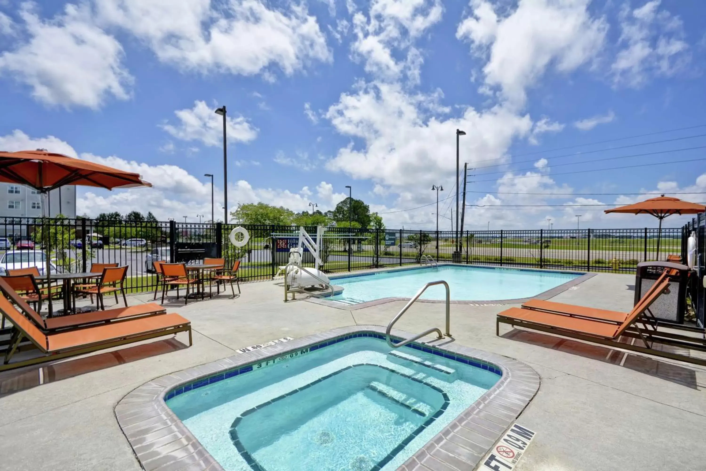 Pool view, Swimming Pool in Hilton Garden Inn Gulfport - Biloxi Airport
